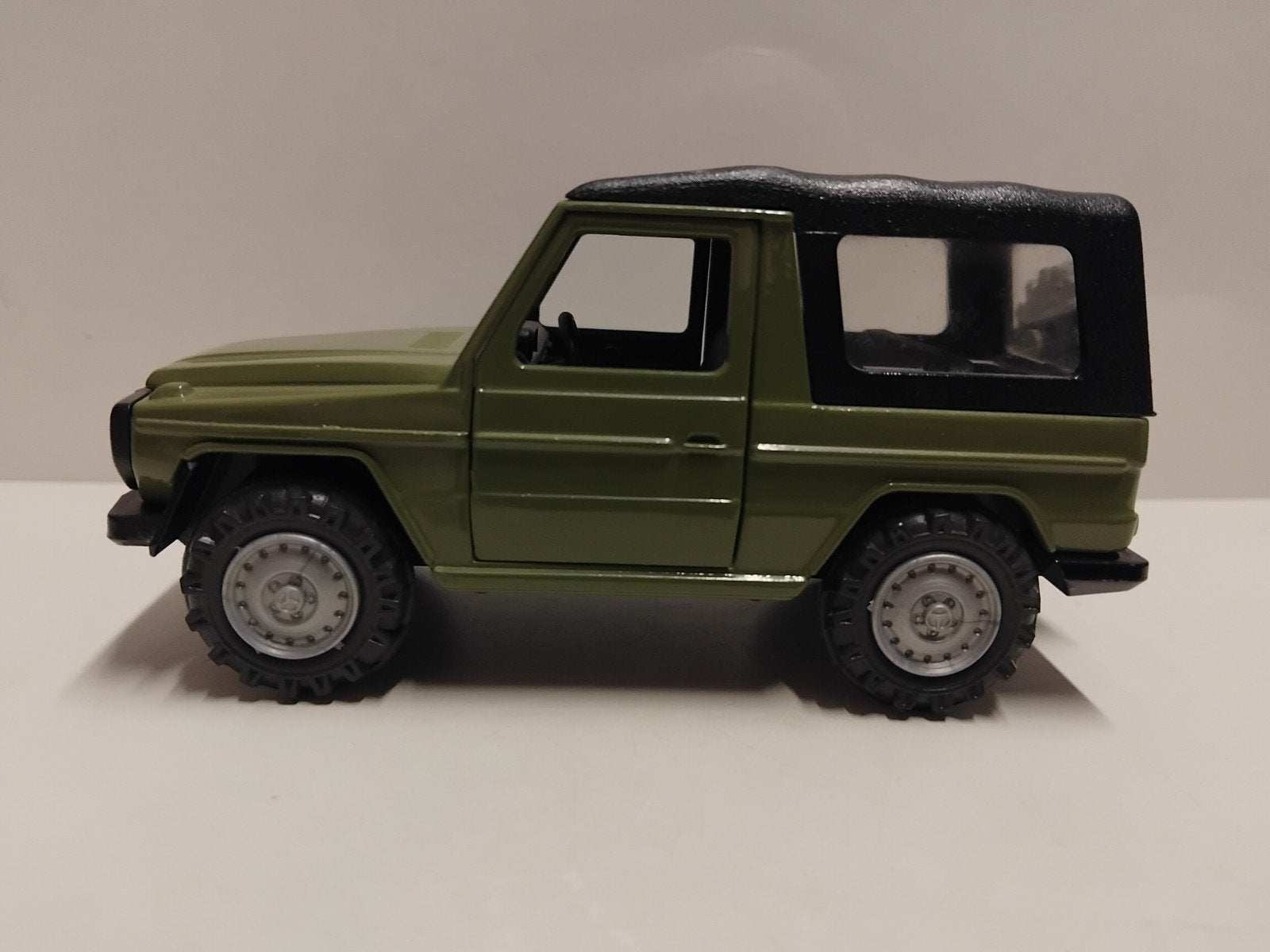 NZG Cursor 1:36 Mercedes Benz 300 G D groen, Ophalen of Verzenden, Zo goed als nieuw, Auto