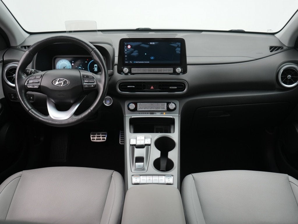 Hyundai KONA EV Premium 64 kWh | Wit leder | Navigatie | Cam, Auto's, 12 maanden, 0 cilinders, Gebruikt, Blauw