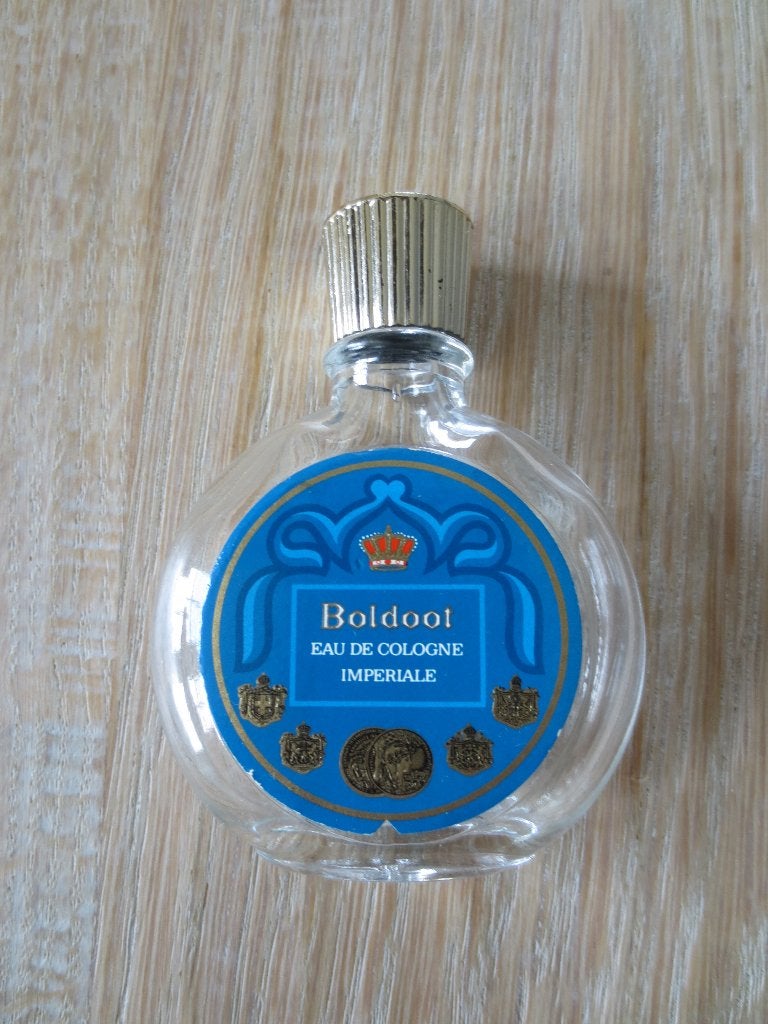 Boldoot: Rond flesje Boldoot Eau de Cologne.Hoog 7/5cm Leeg, Ophalen of Verzenden, Gebruikt, Miniatuur