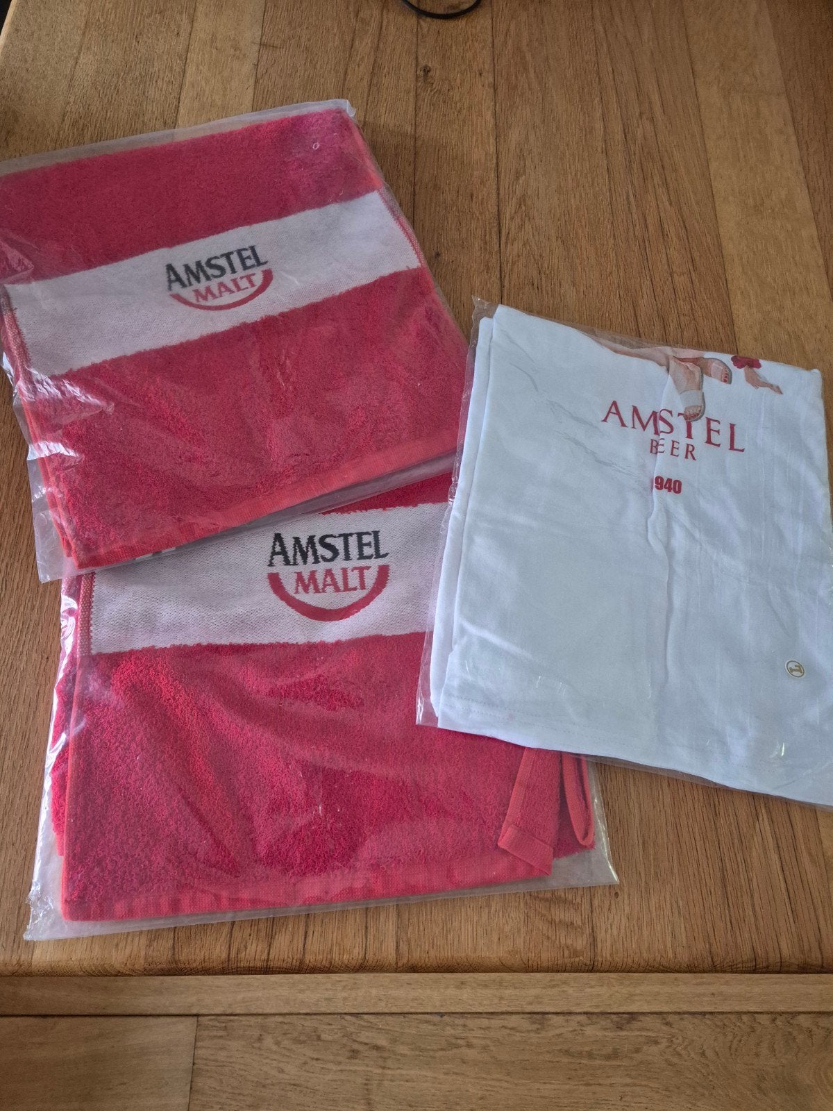 Amstel Malt handdoeken en Amstel Beer T-shirt, Ophalen of Verzenden, Nieuw, Gebruiksvoorwerp