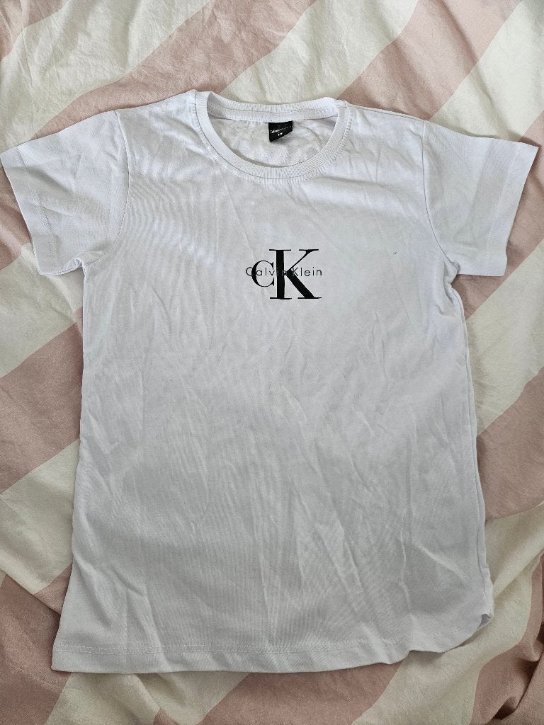Calvin Klein witte shirt maat 128, Ophalen of Verzenden, Nieuw, Meisje, Shirt of Longsleeve