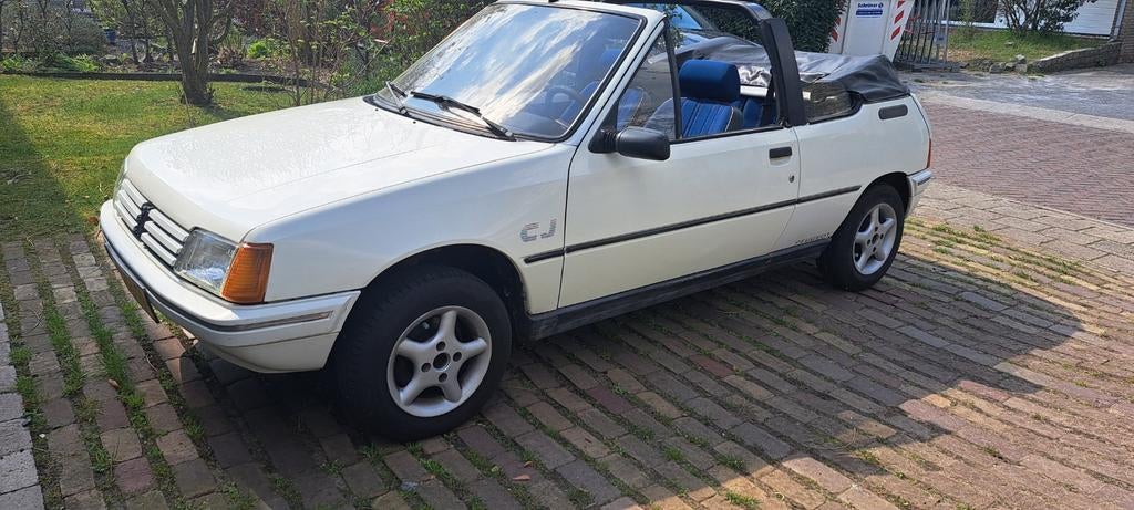 Peugeot 205 1.4 CJ Cabriolet S6 1988 Wit, Auto's, Voorwielaandrijving, 1360 cc, 4 cilinders, Cabriolet