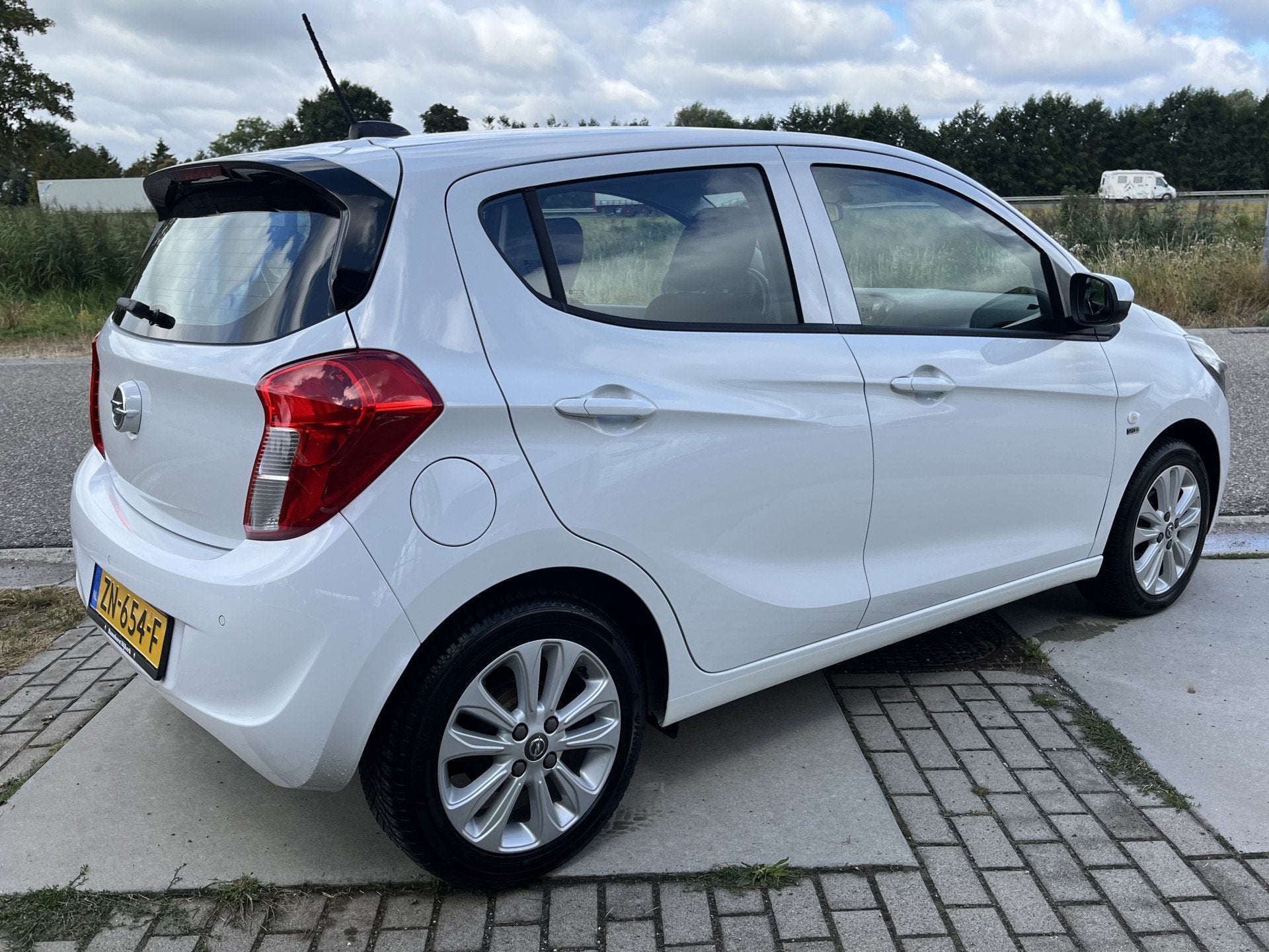 Opel KARL 1.0 ecoFLEX 120 Jaar Edition (bj 2019), Auto's, Opel, Euro 6, Wit, Origineel Nederlands, Bedrijf