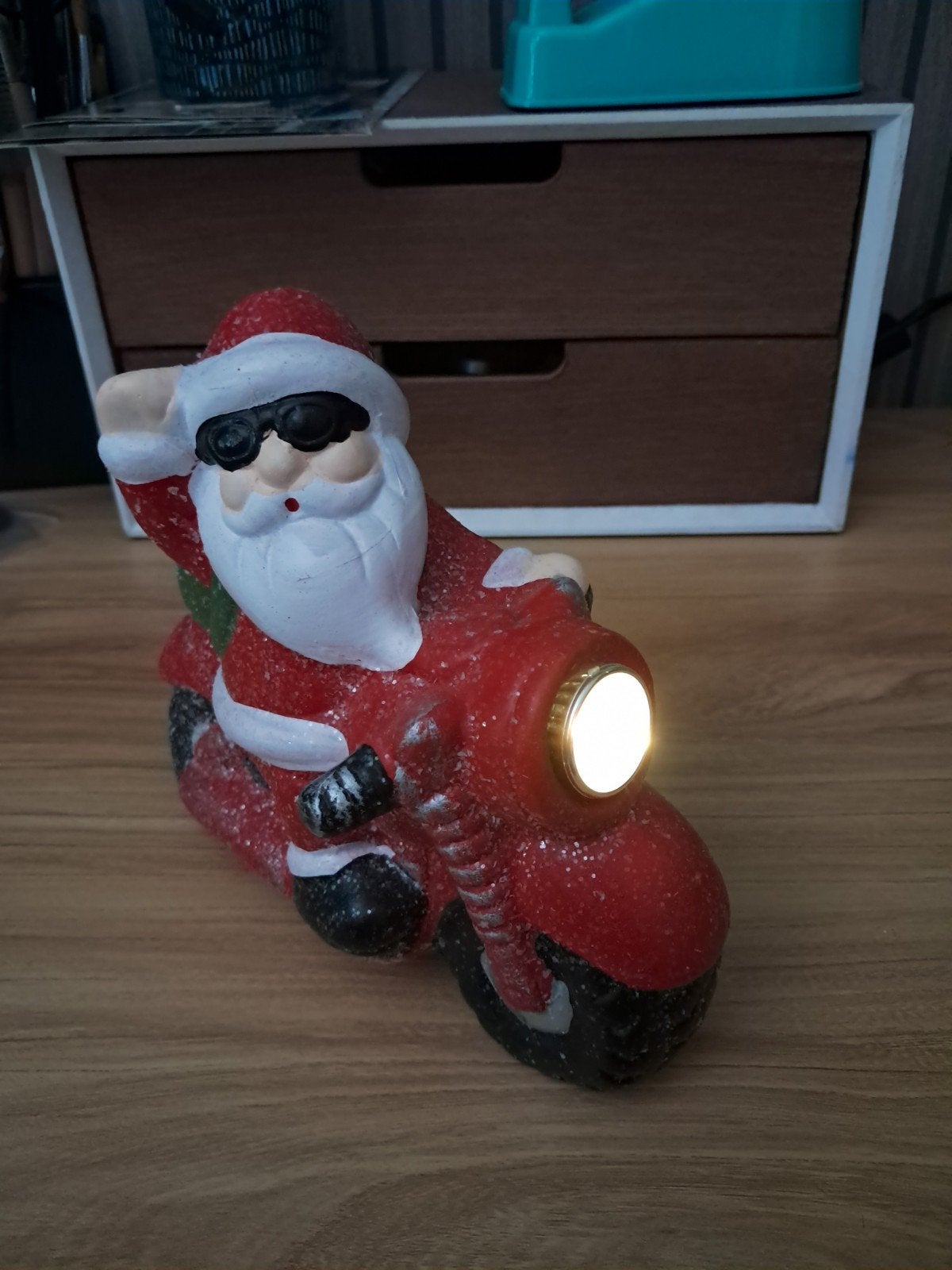 kerstman met brommer, Ophalen