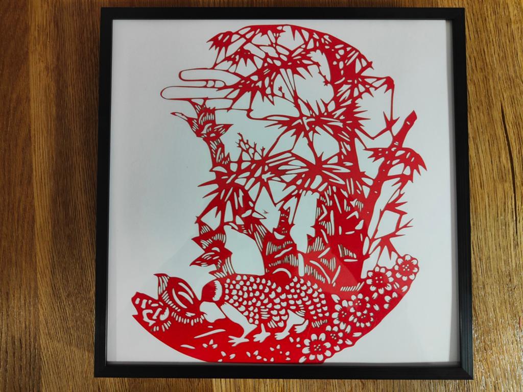 Chinese papieren knipkunst - Konijn in bamboebos, Ophalen