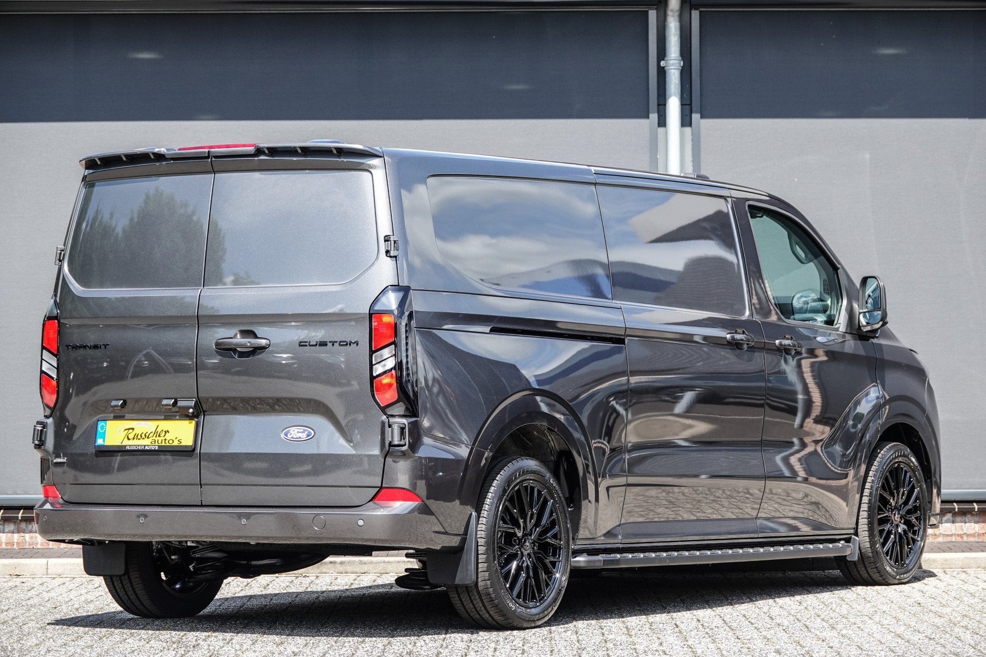 Ford Transit Custom L2H1 2.5PHEV 233Pk Aut. | Limited | Plug, Auto's, Bestelauto's, Stof, Gebruikt, Zwart, 4 cilinders