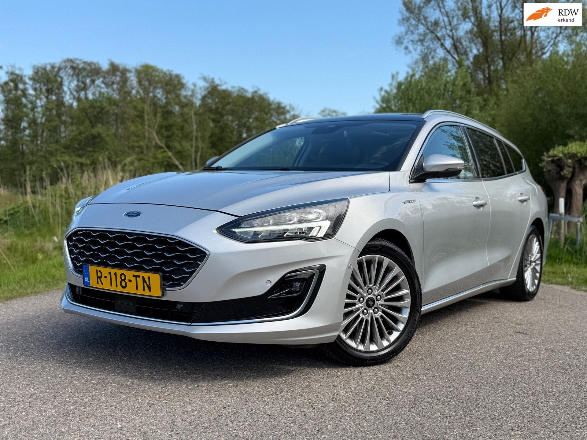 Ford Focus Wagon 1.0 EcoBoost Vignale Automaat / Panoramadak, Auto's, Ford, 125 pk, Gebruikt, Leder, 3 cilinders