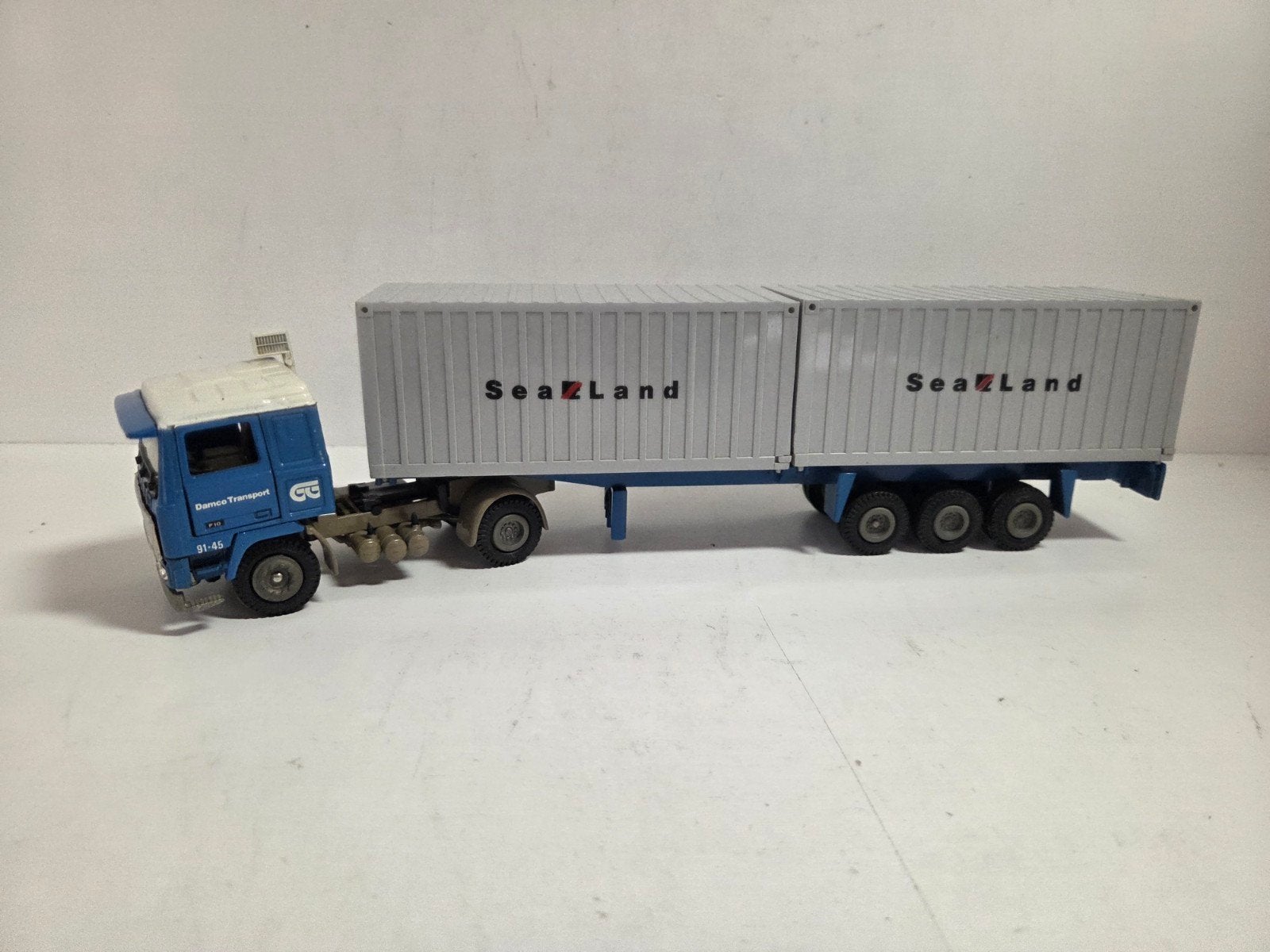 Tekno Volvo F10 containeroplegger Damco, Hobby en Vrije tijd, Modelauto's | 1:50, ., Zo goed als nieuw, ., Ophalen of Verzenden