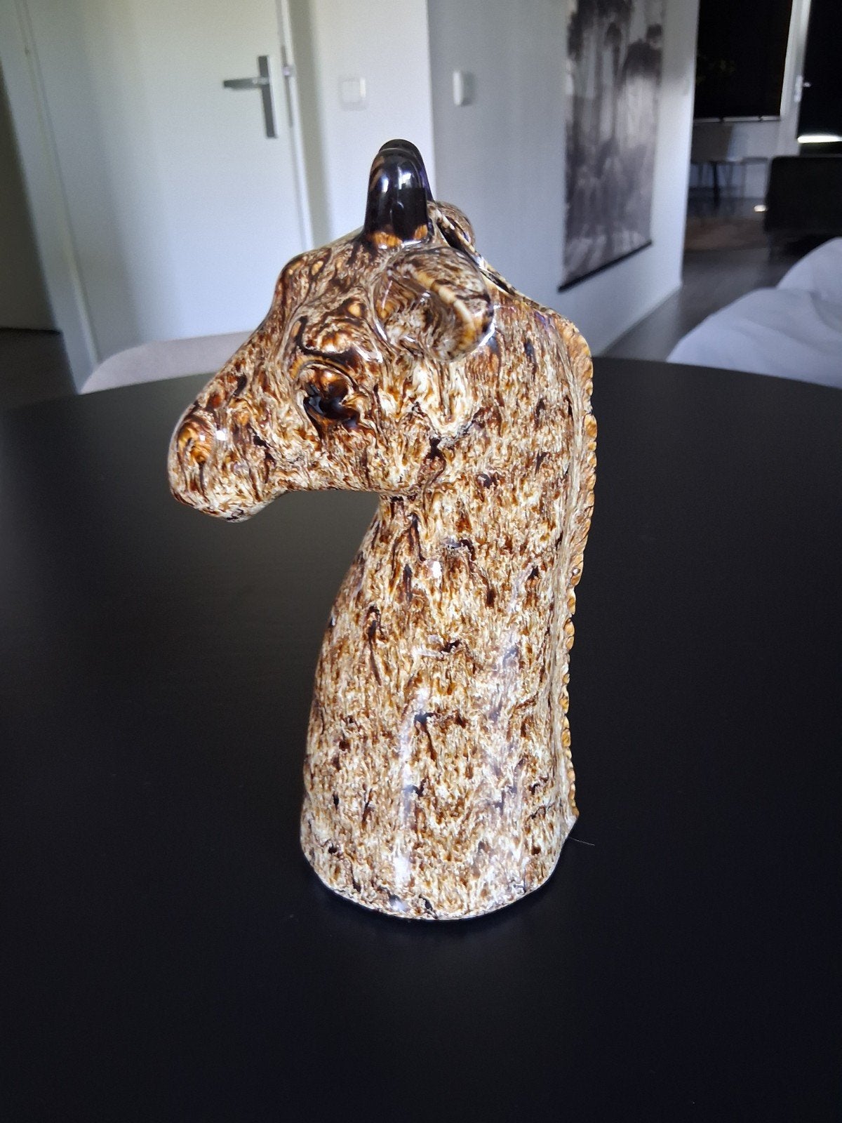 Giraffe vaas, Ophalen