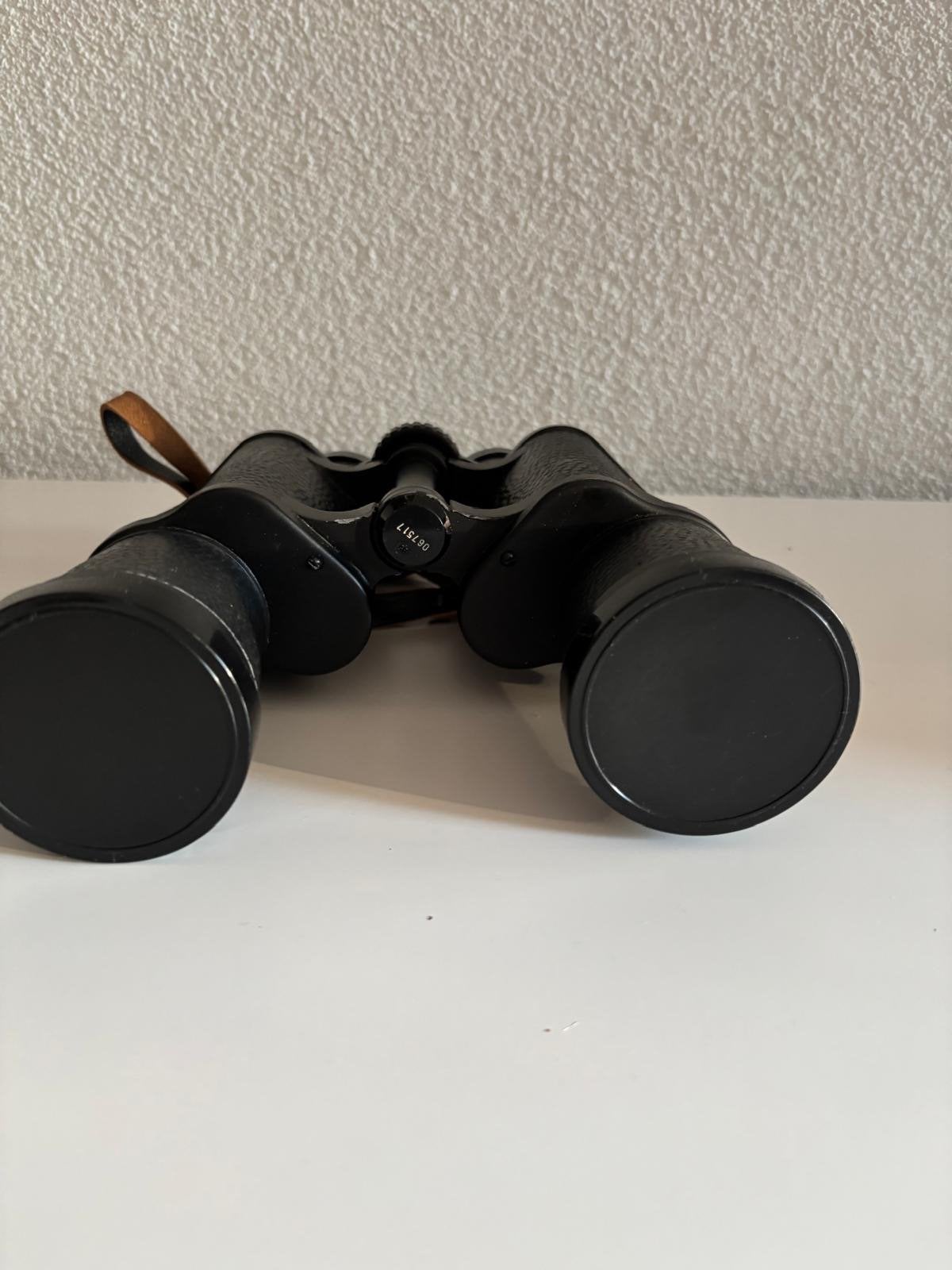 Revue 7x50 verrekijker met leren tas, Ophalen, Gebruikt, Minder dan 8x, Porro (met knik)