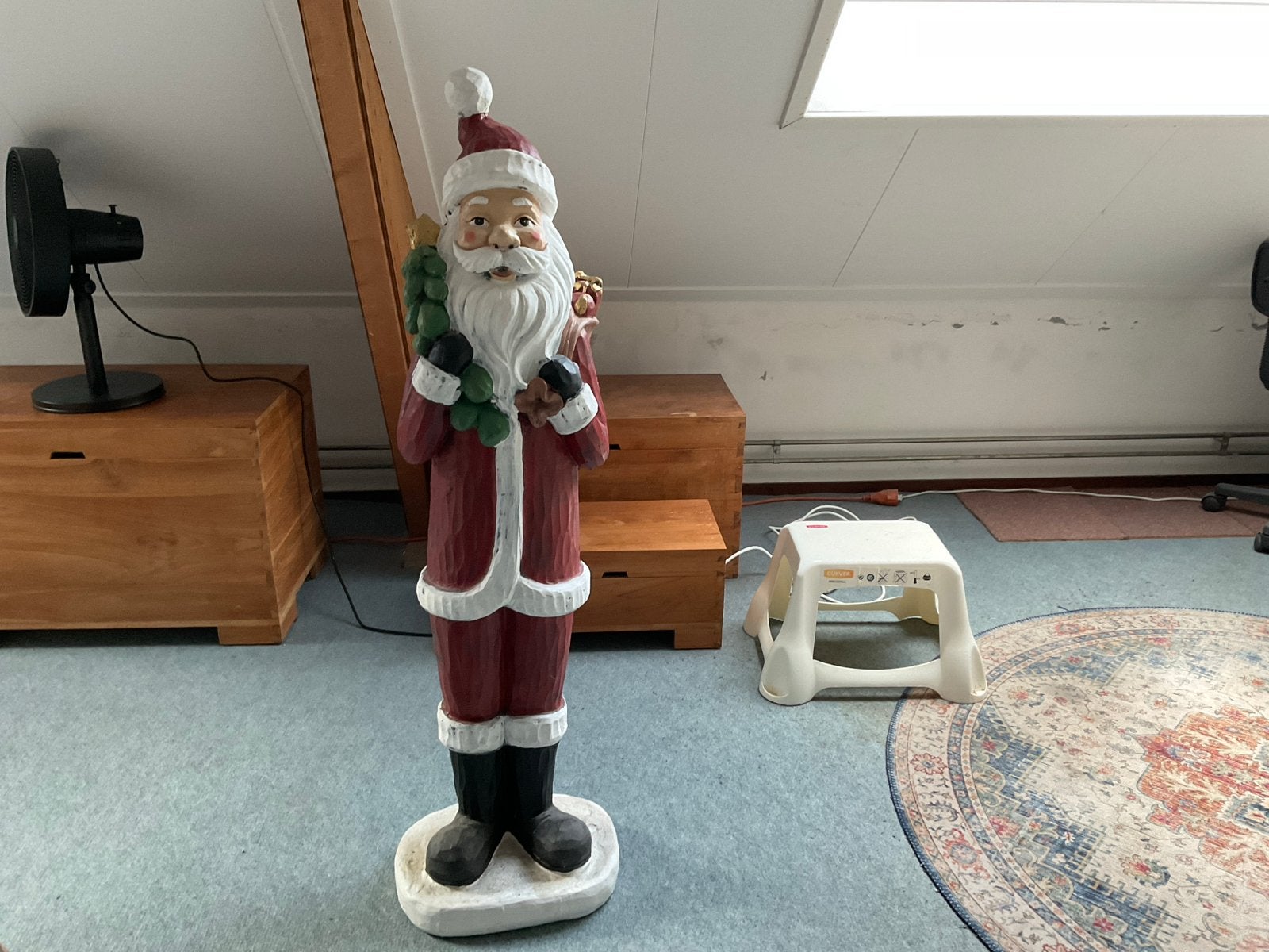 Stenen kerstman, Diversen, Ophalen