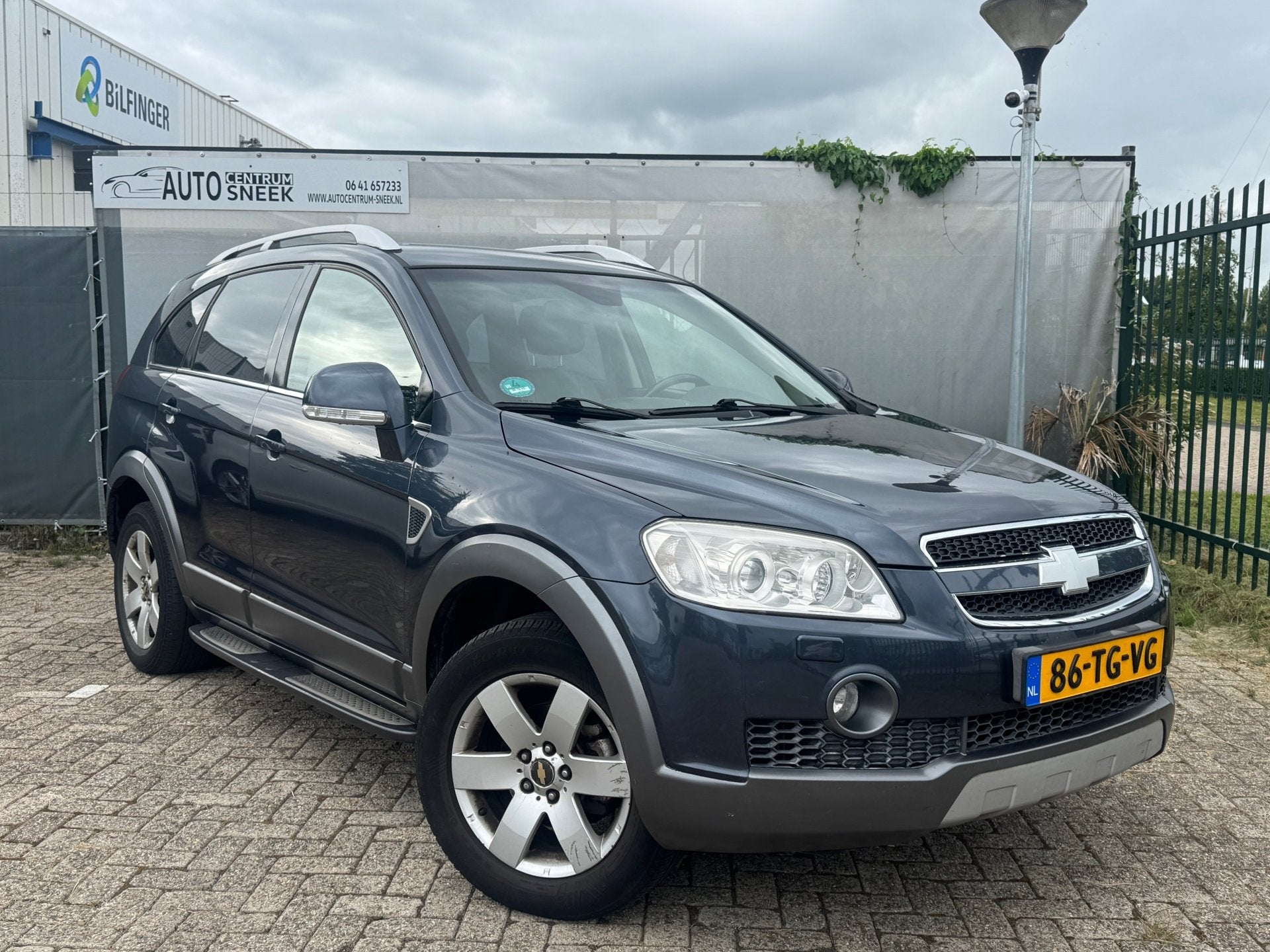 Chevrolet Captiva 2.4i 4x4 - 7 PERS - Clima - Cruise - PDC -, Auto's, Chevrolet, 136 pk, Gebruikt, Zwart, 4 cilinders