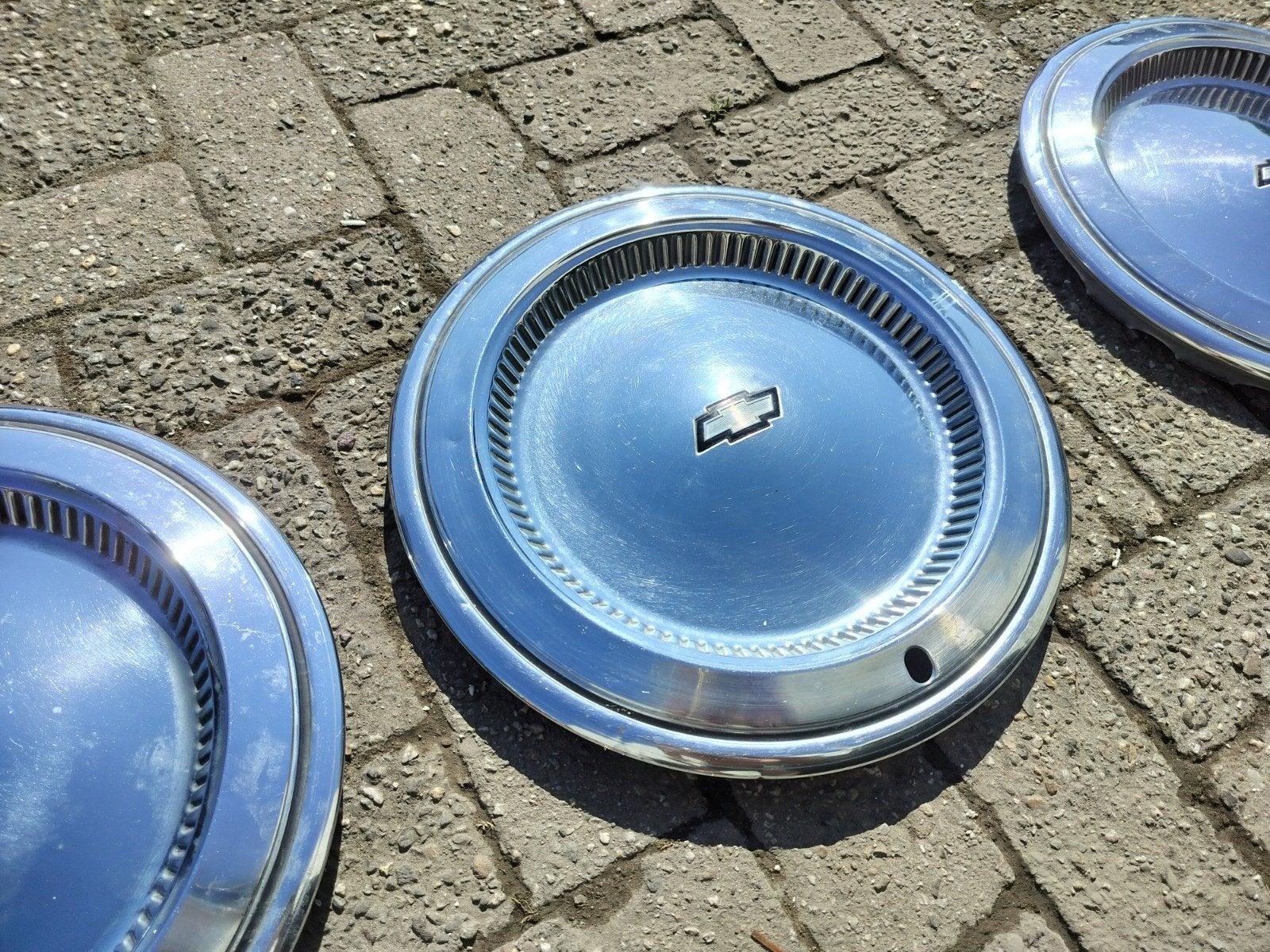 Chevrolet Impala hubcap wieldoppen hub caps chroom, Ophalen