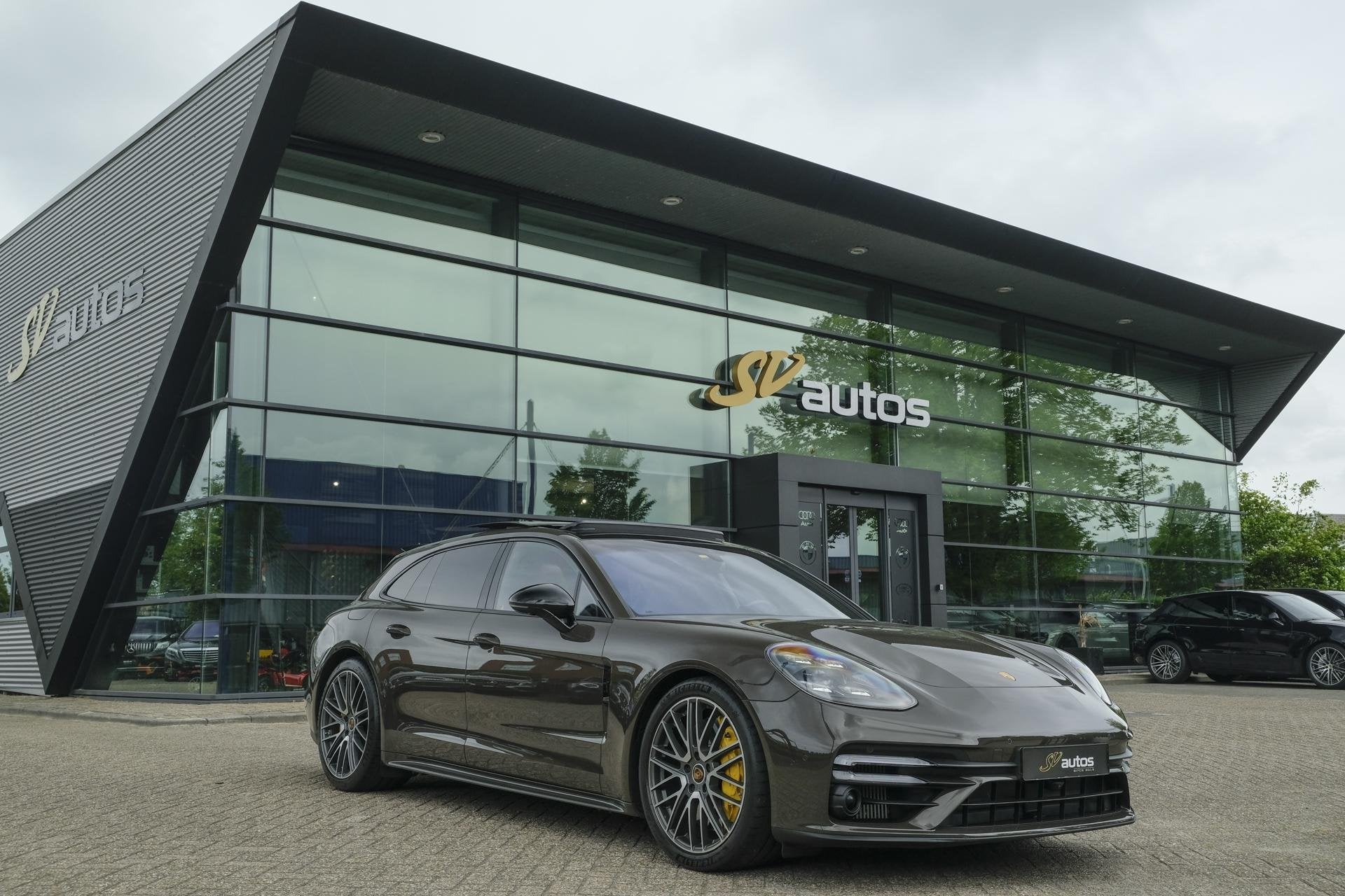 Porsche Panamera Sport Turismo 4.0 V8 Turbo S 700pk E-Hybrid, Auto's, Porsche, Automaat, 700 pk, Gebruikt, Bruin