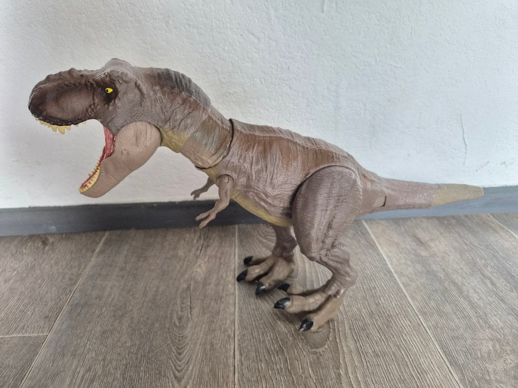 Jurassic World Extreem Happende T-Rex, Kinderen en Baby's, Speelgoed | Actiefiguren, Ophalen of Verzenden, Zo goed als nieuw