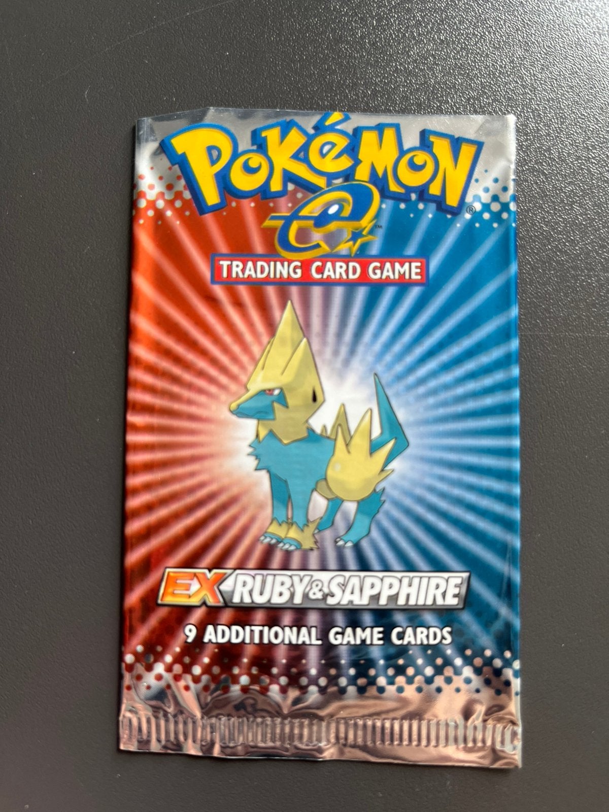 Pokemon booster empty EX ruby and sapphire manectric, Ophalen of Verzenden, Gebruikt, Booster