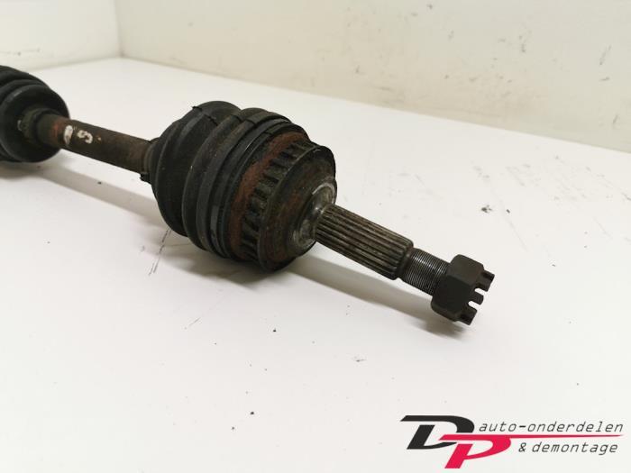 Aandrijfas links-voor van een Opel Tigra, Gebruikt, -, -, Opel