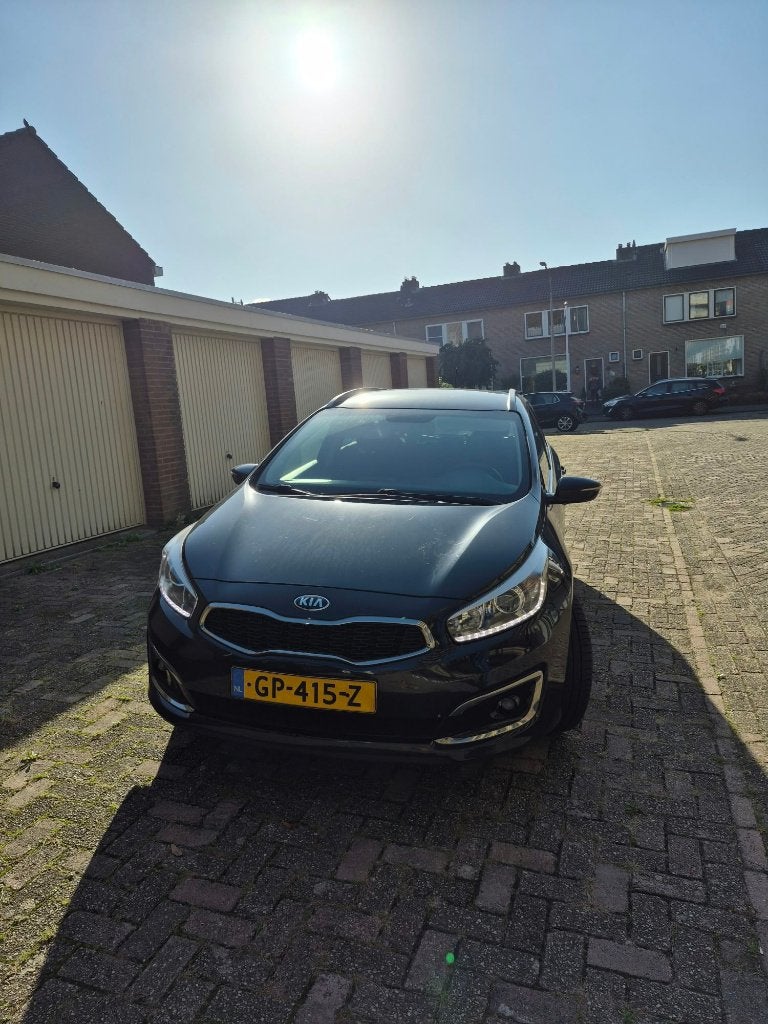 Kia (Pro) Cee d 1.6 GDI Sporty Wagon 2015 Zwart, Auto's, Voorwielaandrijving, 4 cilinders, Leder en Stof, Zwart