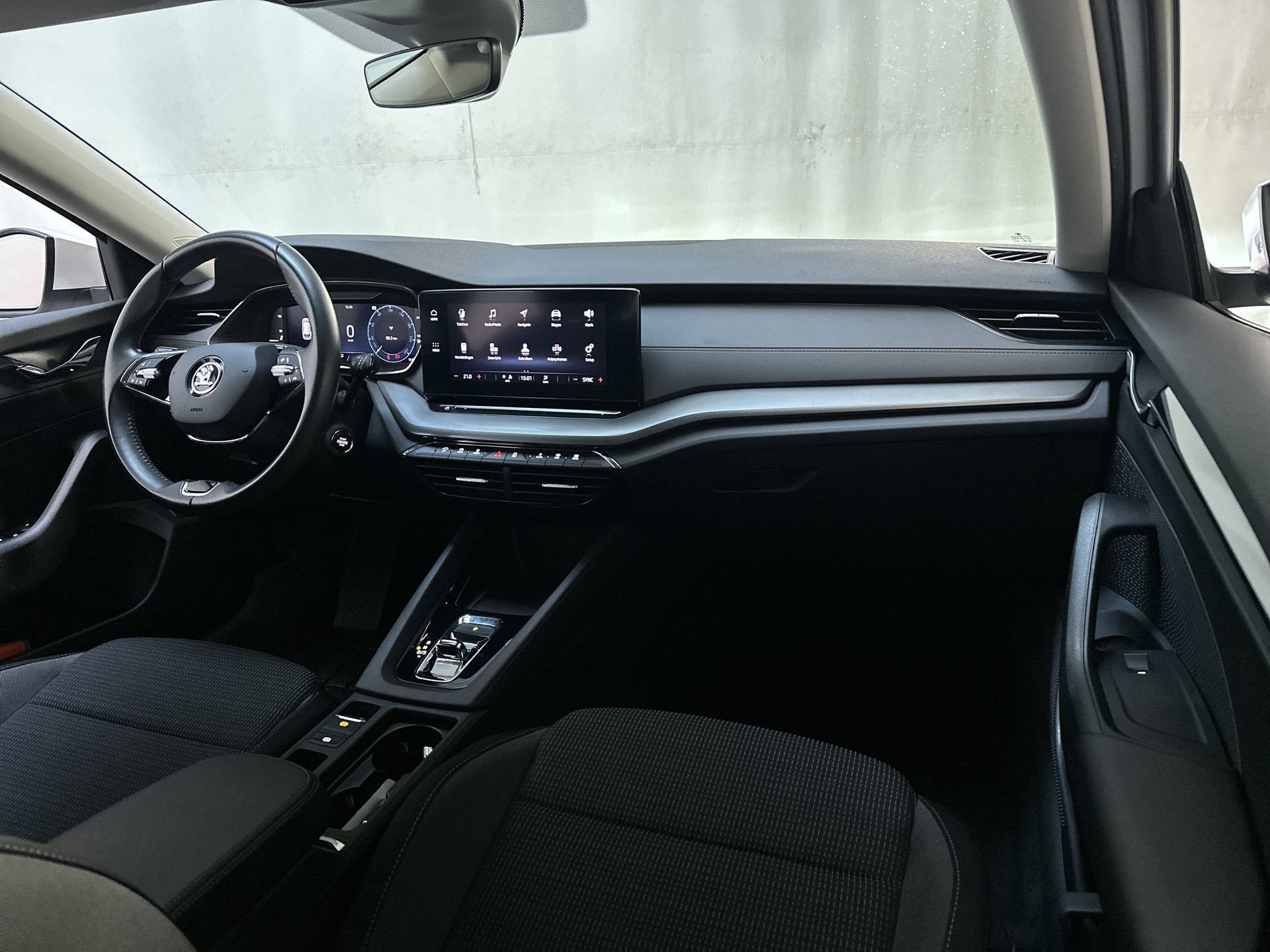 Skoda Octavia Combi 1.0 e-TSI DSG Business Edition Navigatie, Auto's, Stof, Gebruikt, Met garantie (alle), Origineel Nederlands