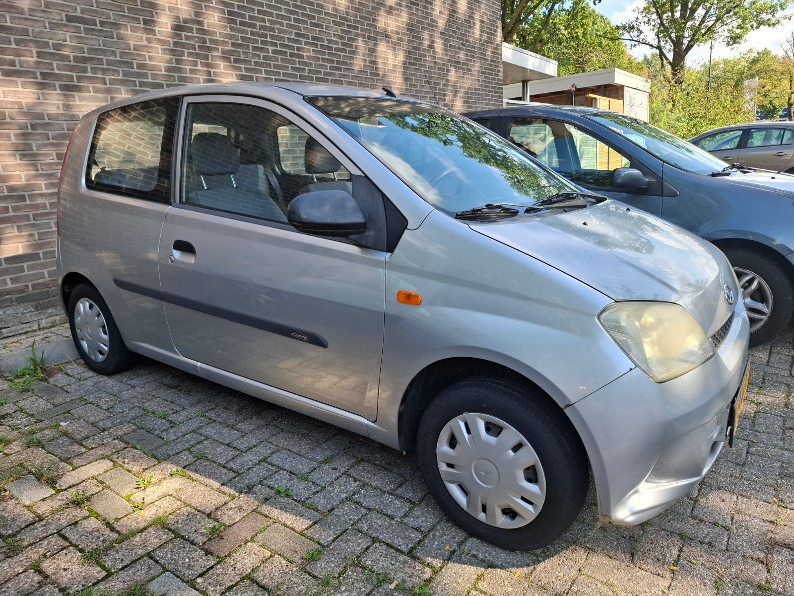 Daihatsu Cuore 1.0 3D 2003 Grijs, Auto's, 600 kg, 18 €/maand, Cuore, Origineel Nederlands
