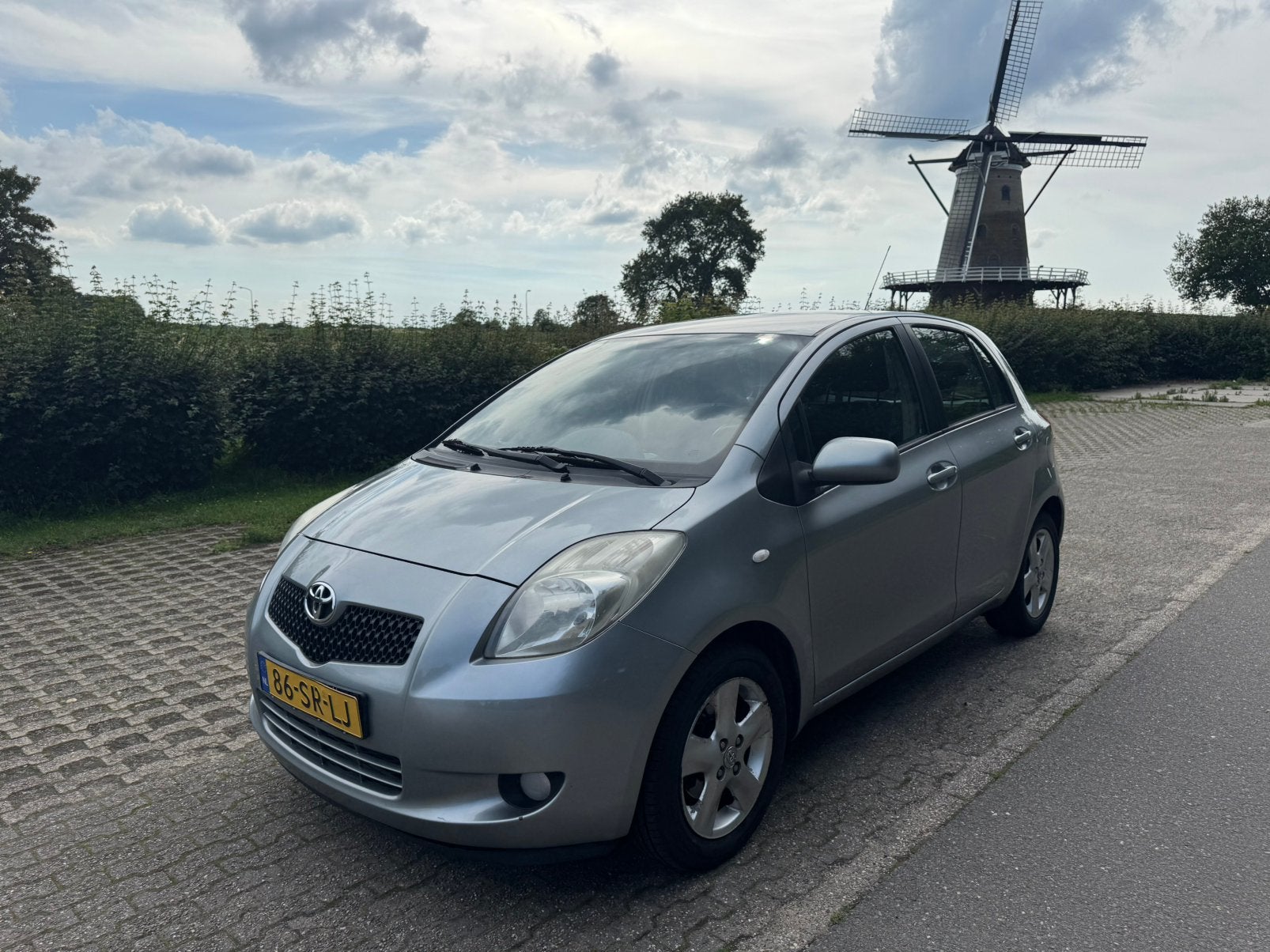 Toyota Yaris 1.3 16V Vvt-i 5DR 2006 Grijs, Auto's, Toyota, Particulier, Yaris, ABS, Airbags, Airconditioning, Centrale vergrendeling
