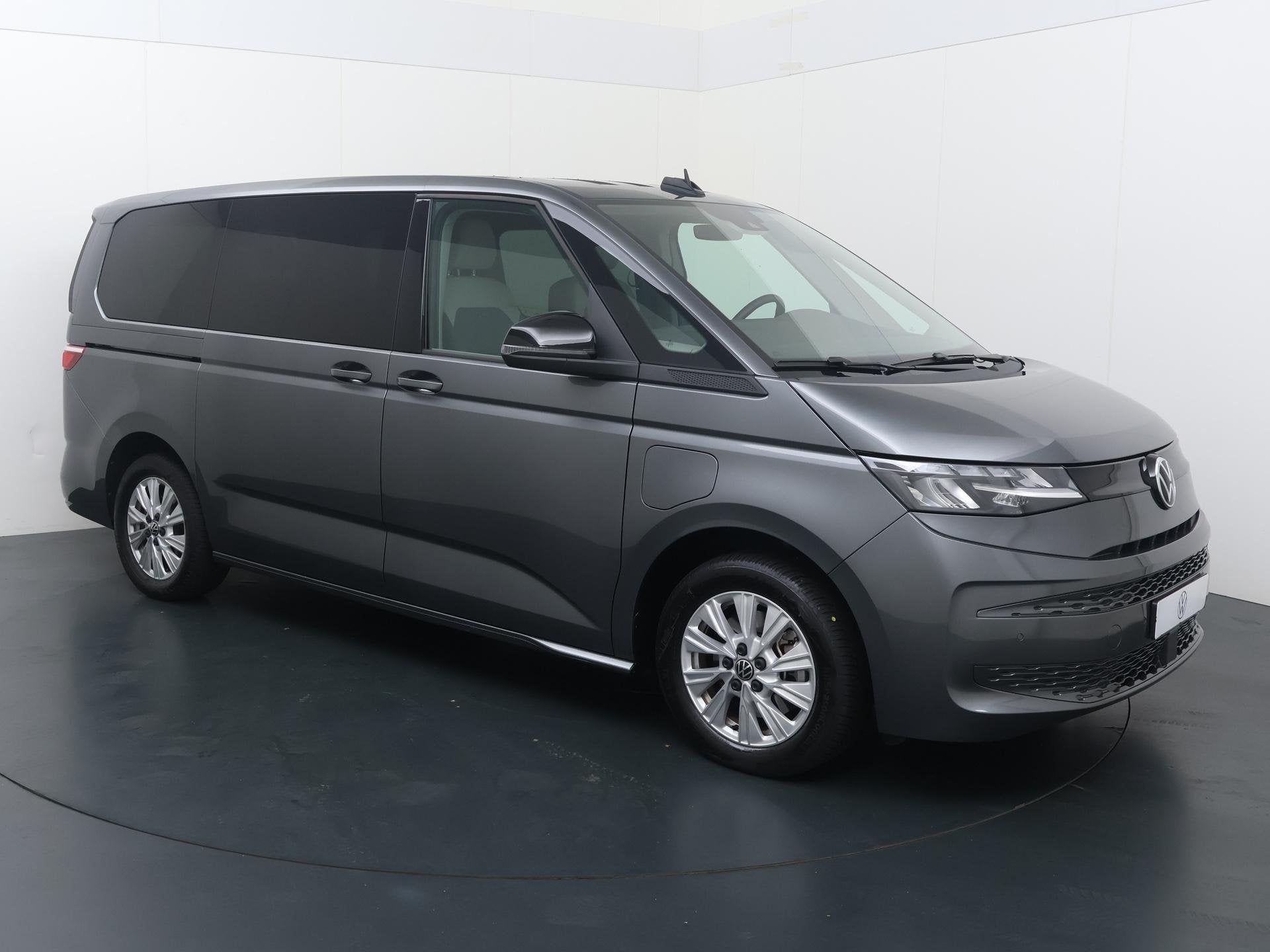 Volkswagen Bedrijfswagens Multivan 1.5 eHybrid L2 Economy Bu, Auto's, Automaat, 12 maanden, Stof, Euro 6