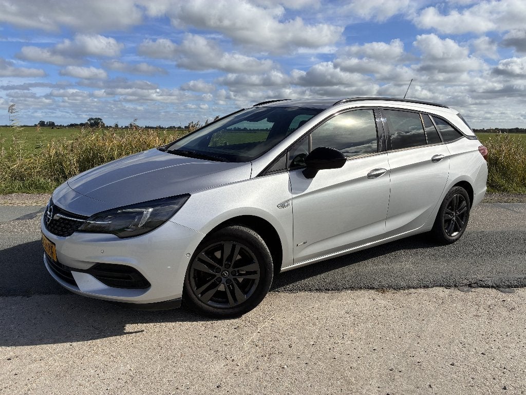 Opel Astra Tourer 1.2 Turbo 2021 195000km carplay stoelverw., Voorwielaandrijving, Stof, 1250 kg, Zwart