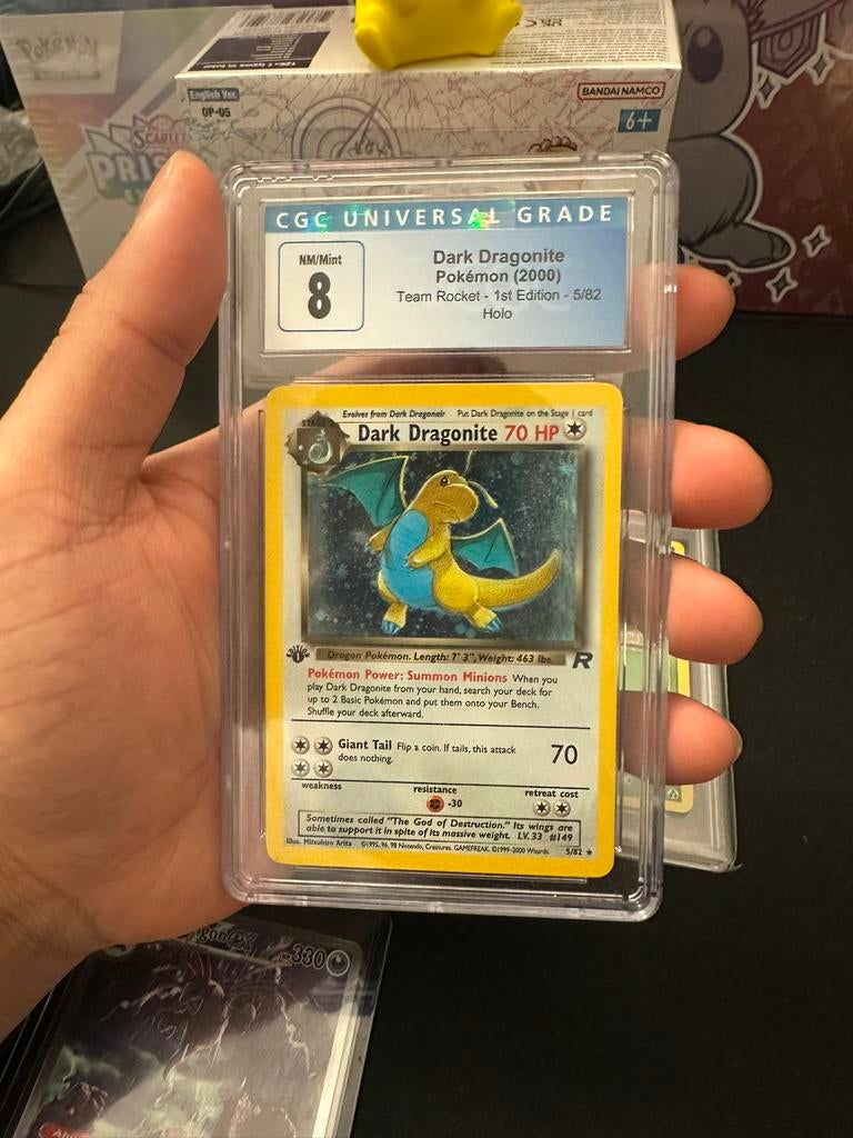 Dark Dragonite 1st Edition Holo CGC 8, Ophalen of Verzenden, Zo goed als nieuw