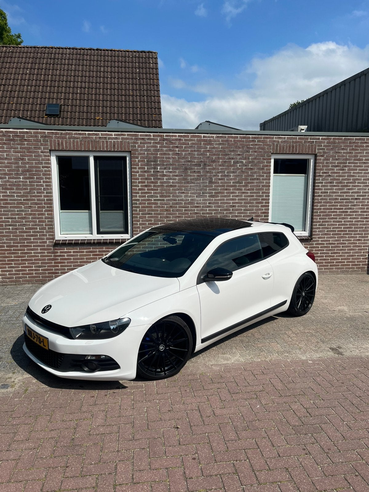 Volkswagen Scirocco 1.4 TSI 90KW BMT 2010 Wit, Auto's, Volkswagen, Voorwielaandrijving, Navigatiesysteem, 4 cilinders, 4 stoelen