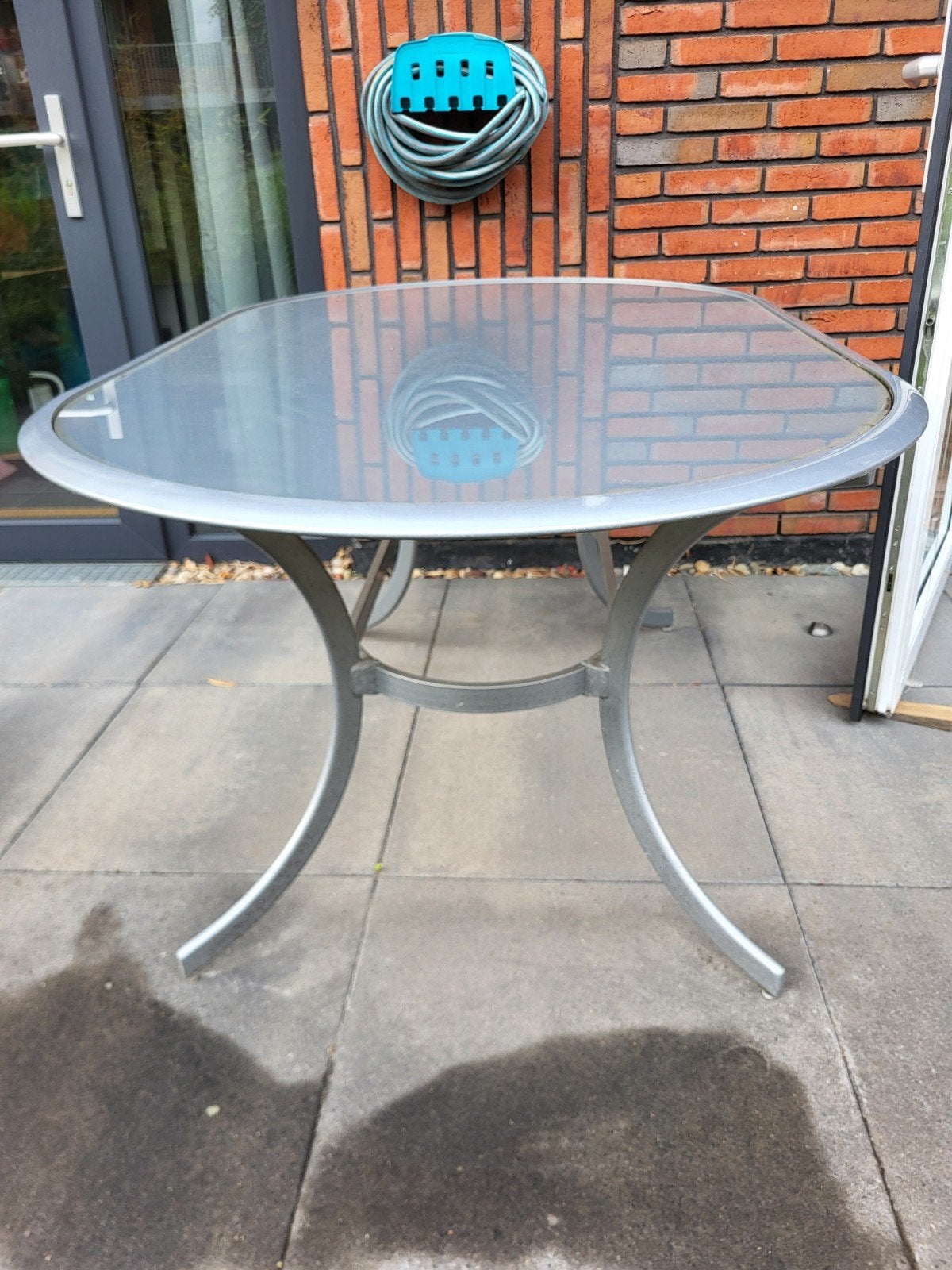 Mooie tuintafel met glazen blad en metalen frame, Tuin en Terras, Ophalen, Gebruikt, Rechthoekig, Metaal