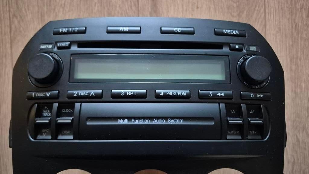 Originele Autoradio/  cd en mp3 speler Mazda MX5 NC, Auto diversen, Autoradio's, Ophalen