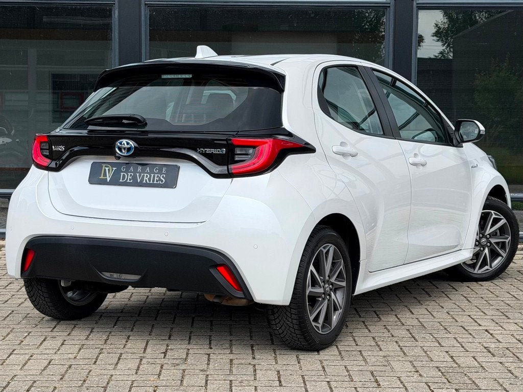 Toyota Yaris 1.5 Hybrid Executive ACC Head Up Camera CarPlay, Auto's, Toyota, Stof, Gebruikt, Zwart, Adaptive Cruise Control