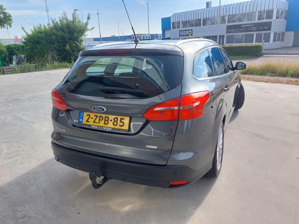 Ford Focus Wagon 1.0 Titanium Edition Airco/ECC/LMV/NAV, Gebruikt, Origineel Nederlands, Handgeschakeld, 1216 kg