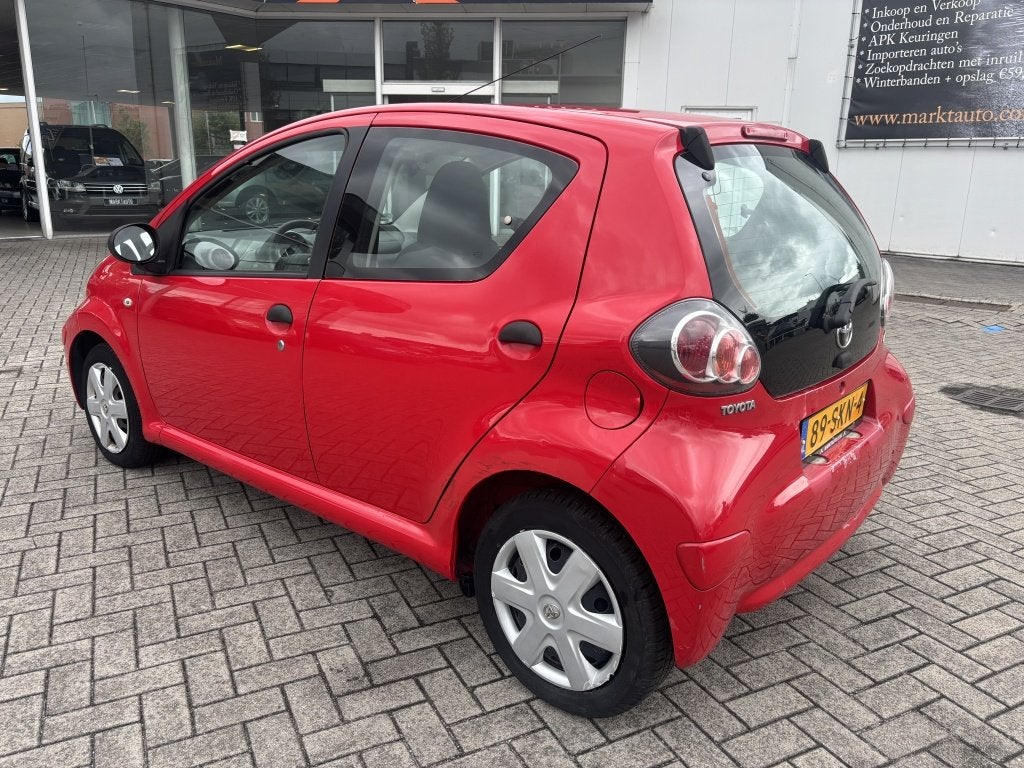 Toyota Aygo 1.0-12V Access Boordcomputer Radio/CD (bj 2011), Auto's, Euro 5, Gebruikt, 4 stoelen, 68 pk