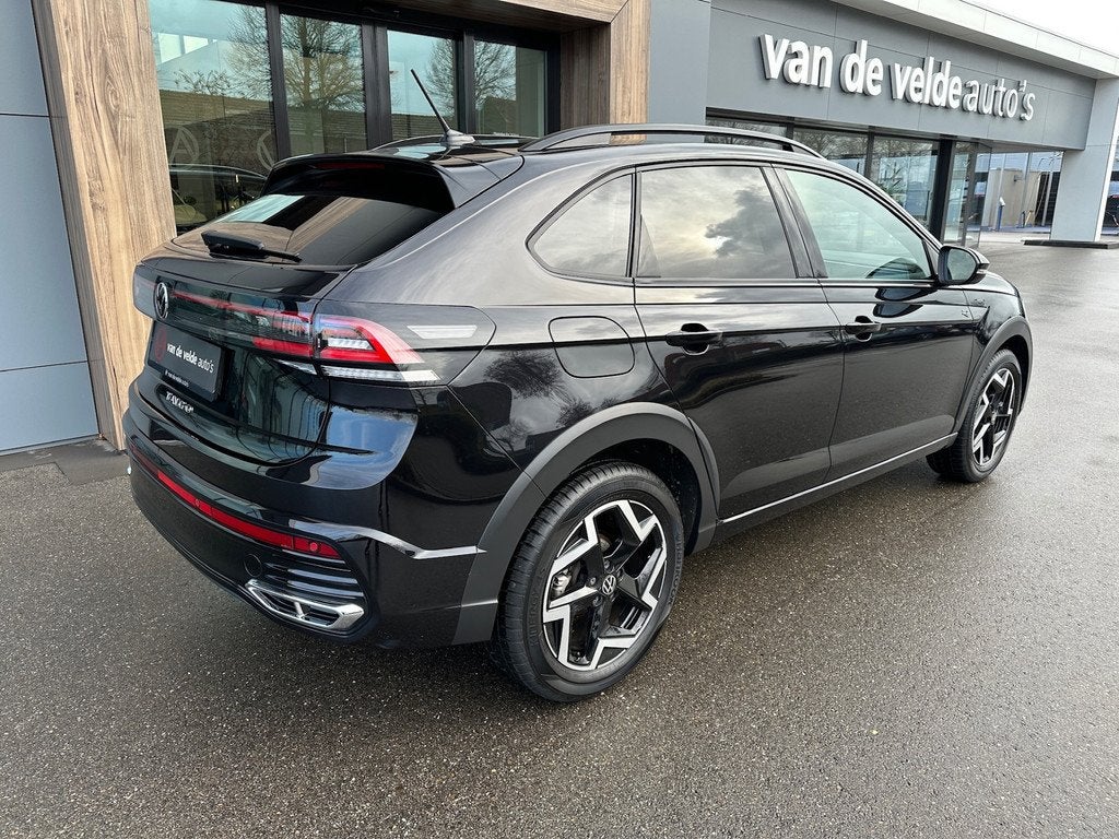Volkswagen Taigo 1.5 TSI 150pk DSG R-Line | Trekhaak | IQ li, Auto's, Volkswagen, 12 maanden, Zwart, 4 cilinders, 1192 kg
