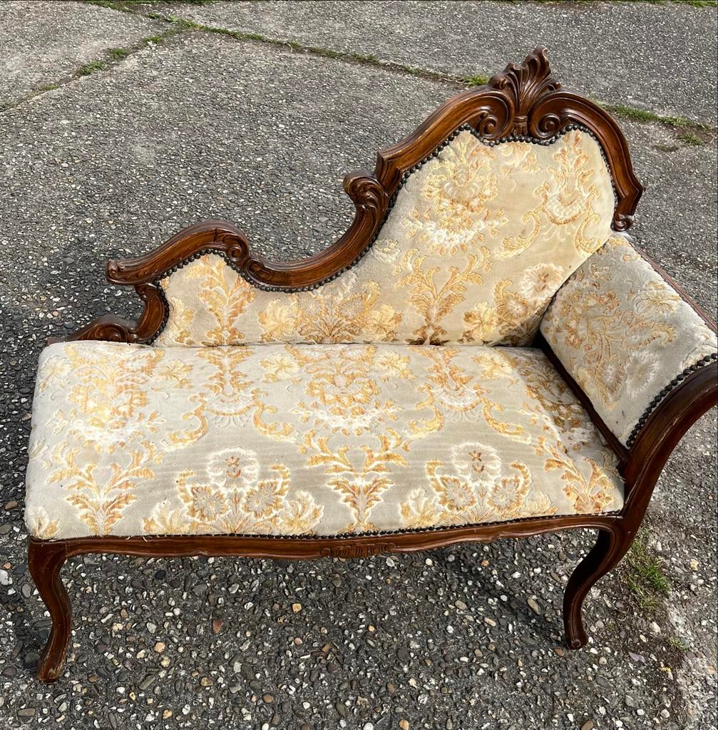 Antieke chaise longue met barokke details, Ophalen