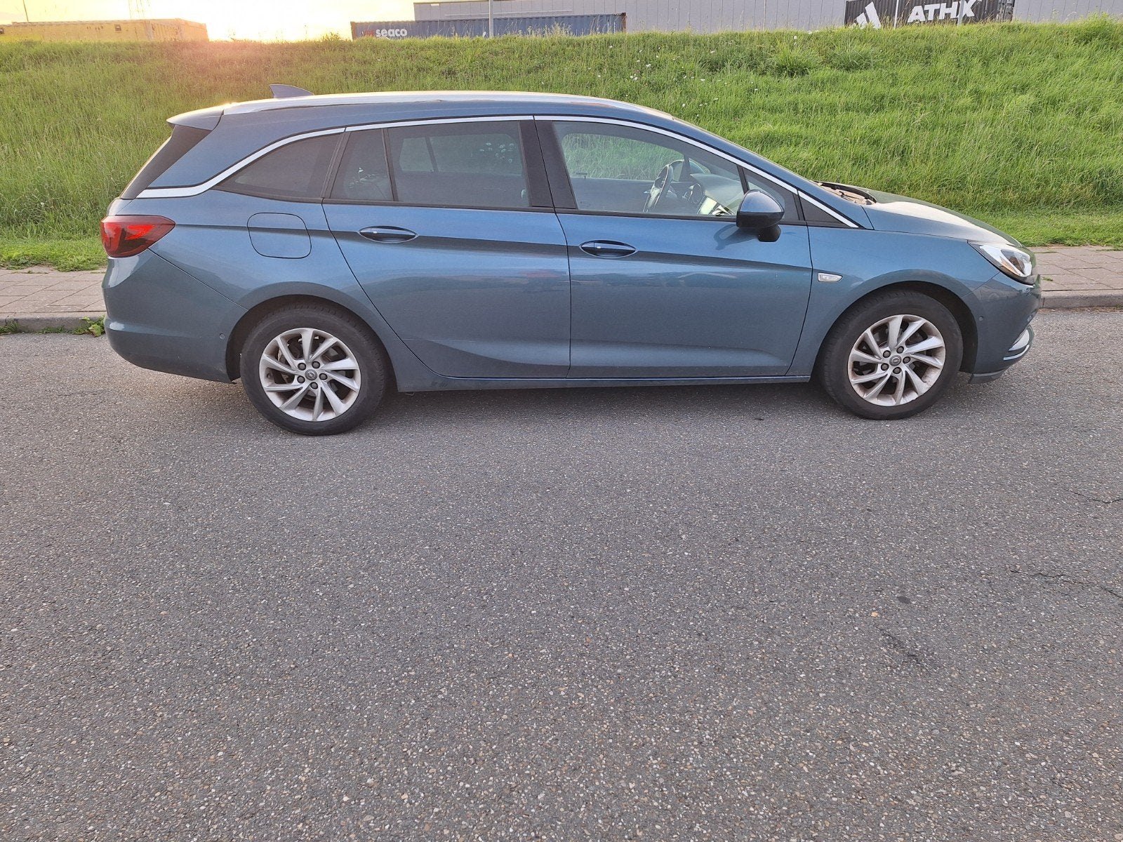 Opel Astra 1.4 Turbo 110KW Sports Tourer 2017 Blauw, Auto's, Voorwielaandrijving, 4 cilinders, Blauw, Bluetooth
