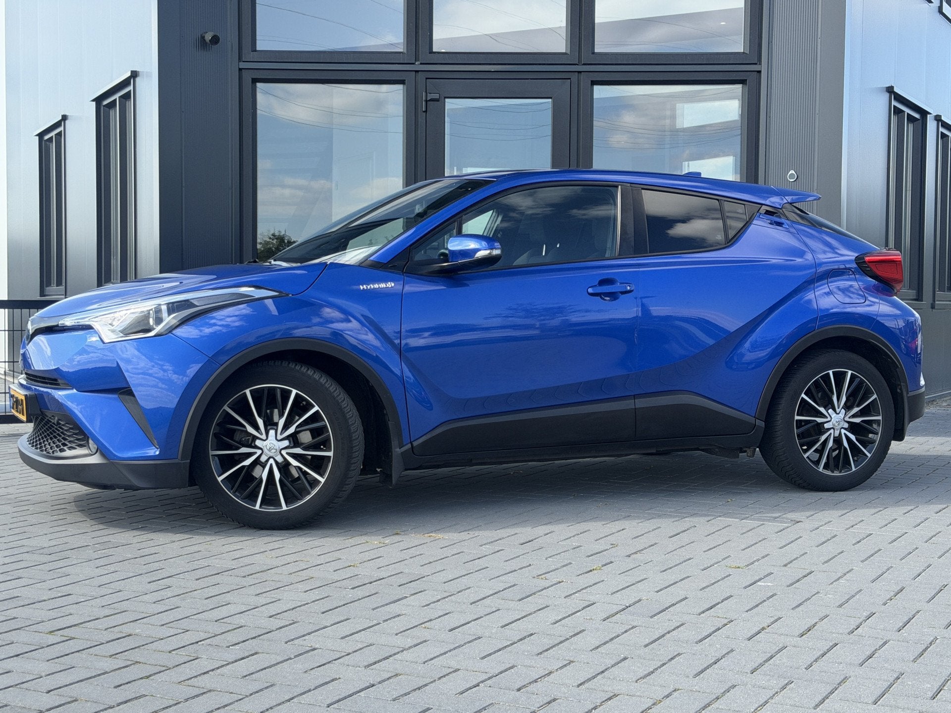 Toyota C-HR 1.8 Hybrid Active Clima | Cruise | Camera | Supe, Auto's, Toyota, Stof, 4 cilinders, Blauw, Origineel Nederlands