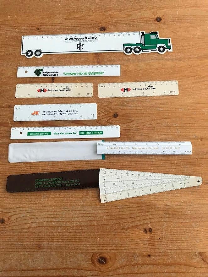 8 Meetlatten/ linialen met reclameteksten., Ophalen of Verzenden, Gebruikt