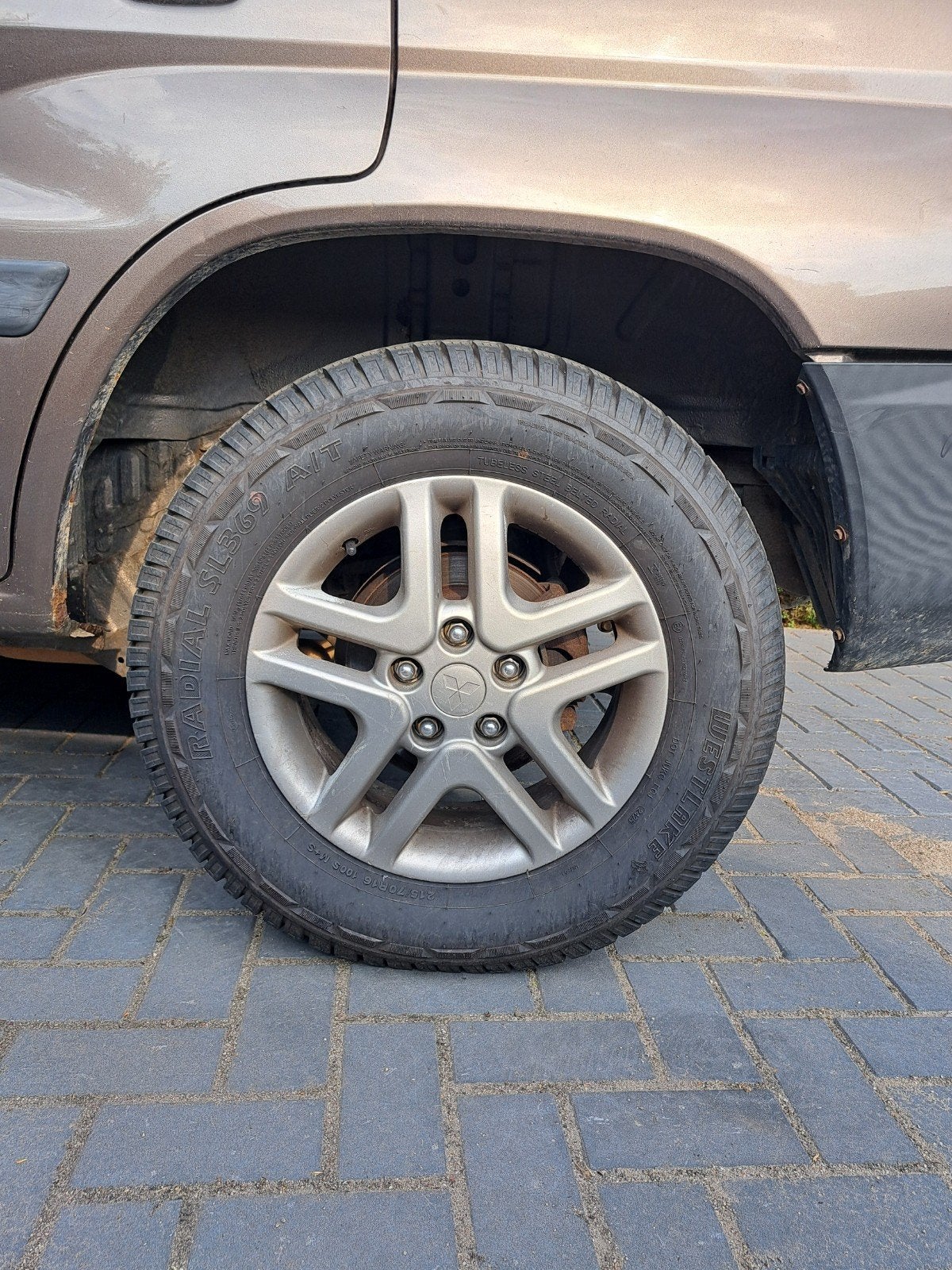215/70R16 A/T banden lichtmetalen velgen, Ophalen