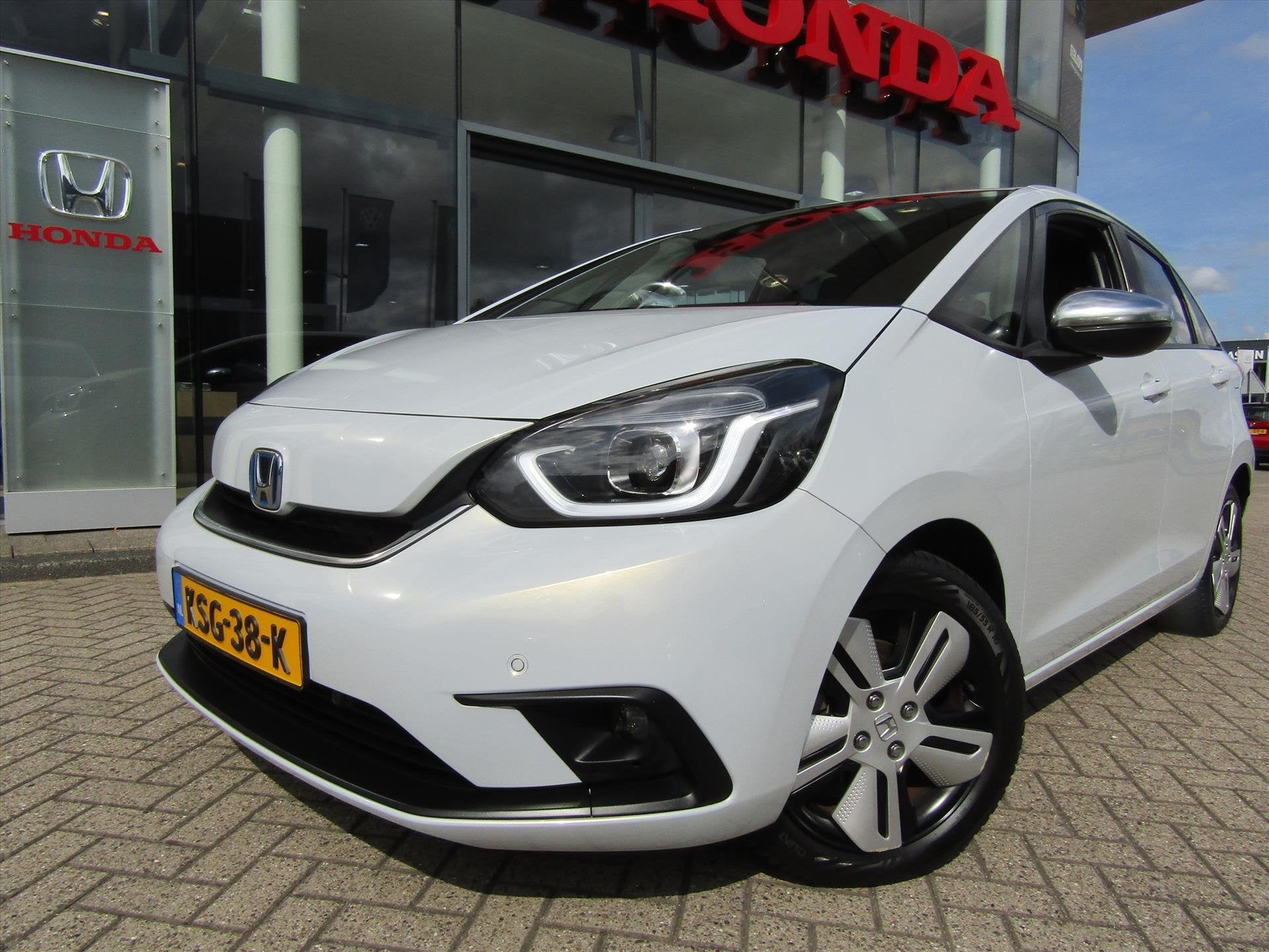Honda Jazz 1.5 i-MMD 109pk Hybrid CVT, Auto's, Honda, Automaat, Dealer onderhouden, Metallic lak, Leder en Stof
