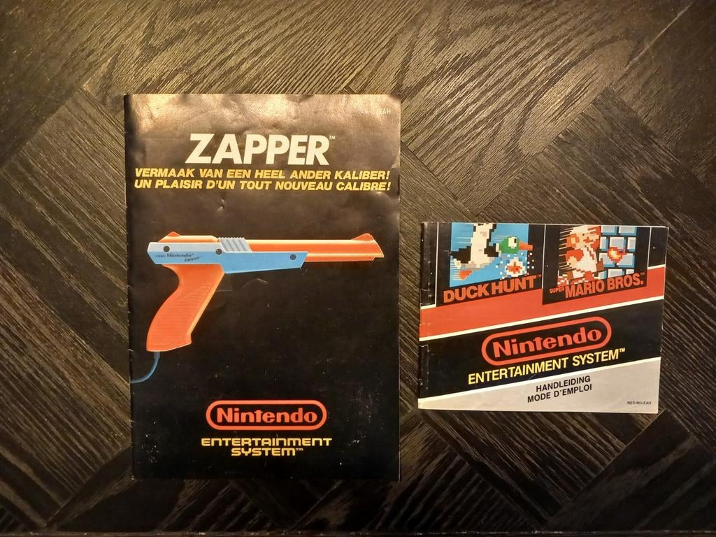 Nintendo nes handleiding zapper en mario/duckhunt, Spelcomputers en Games, Games | Nintendo NES, Avontuur en Actie, 1 speler, Ophalen of Verzenden