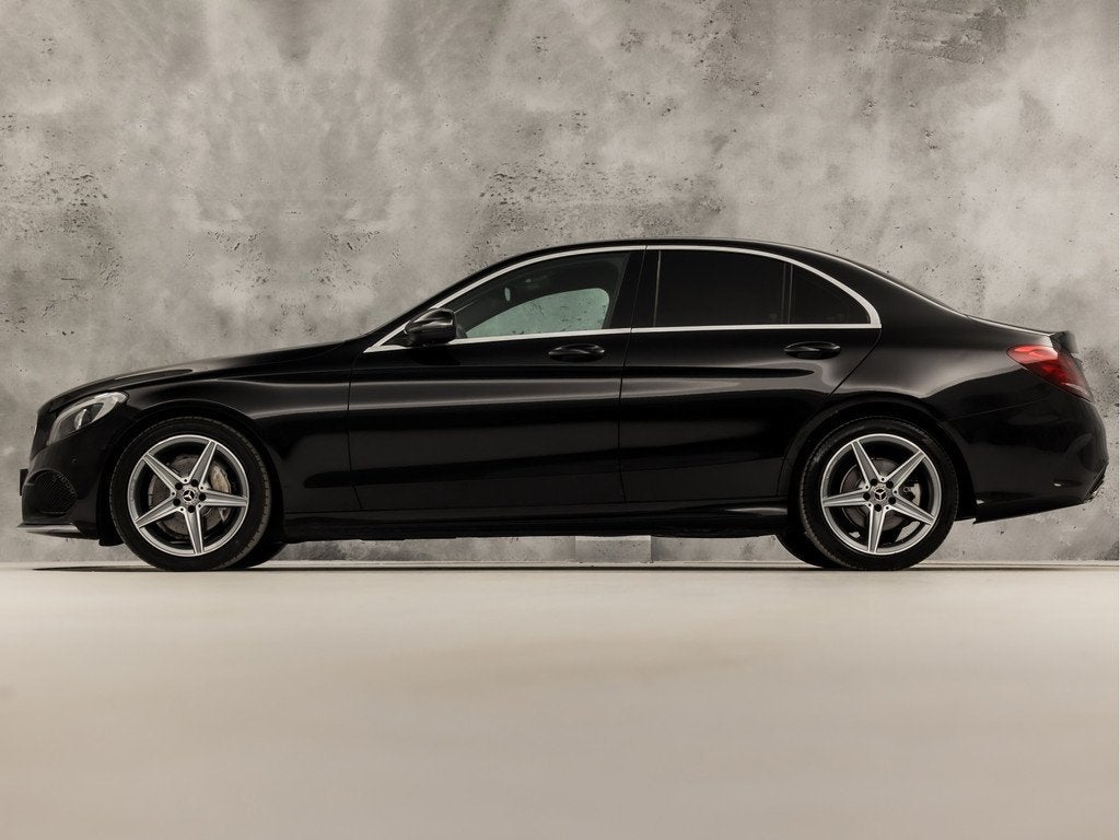 Mercedes-Benz C-Klasse 180 AMG Sport 156Pk Automaat (NAVIGAT, Auto's, Automaat, 12 maanden, Zwart, Bedrijf