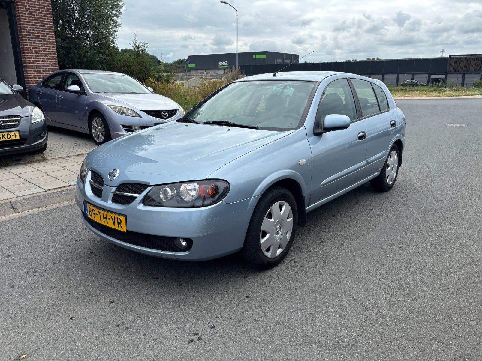 Nissan Almera 1.5 5D 2006 Blauw Airco/Trekhaak! Dealeronderh, 4 cilinders, Blauw, Bedrijf, Handgeschakeld
