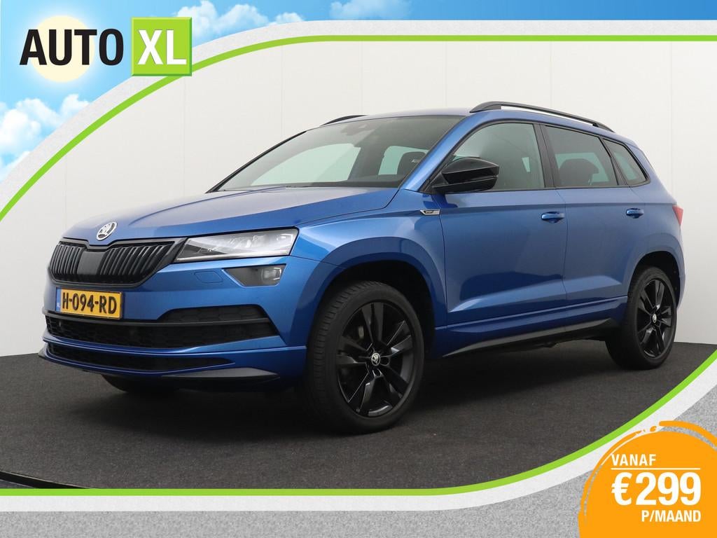 Skoda Karoq 1.5 150 PK Aut. TSI Sportline Camera Dodehoek Ad, Auto's, Skoda, Stof, 4 cilinders, 150 pk, Blauw