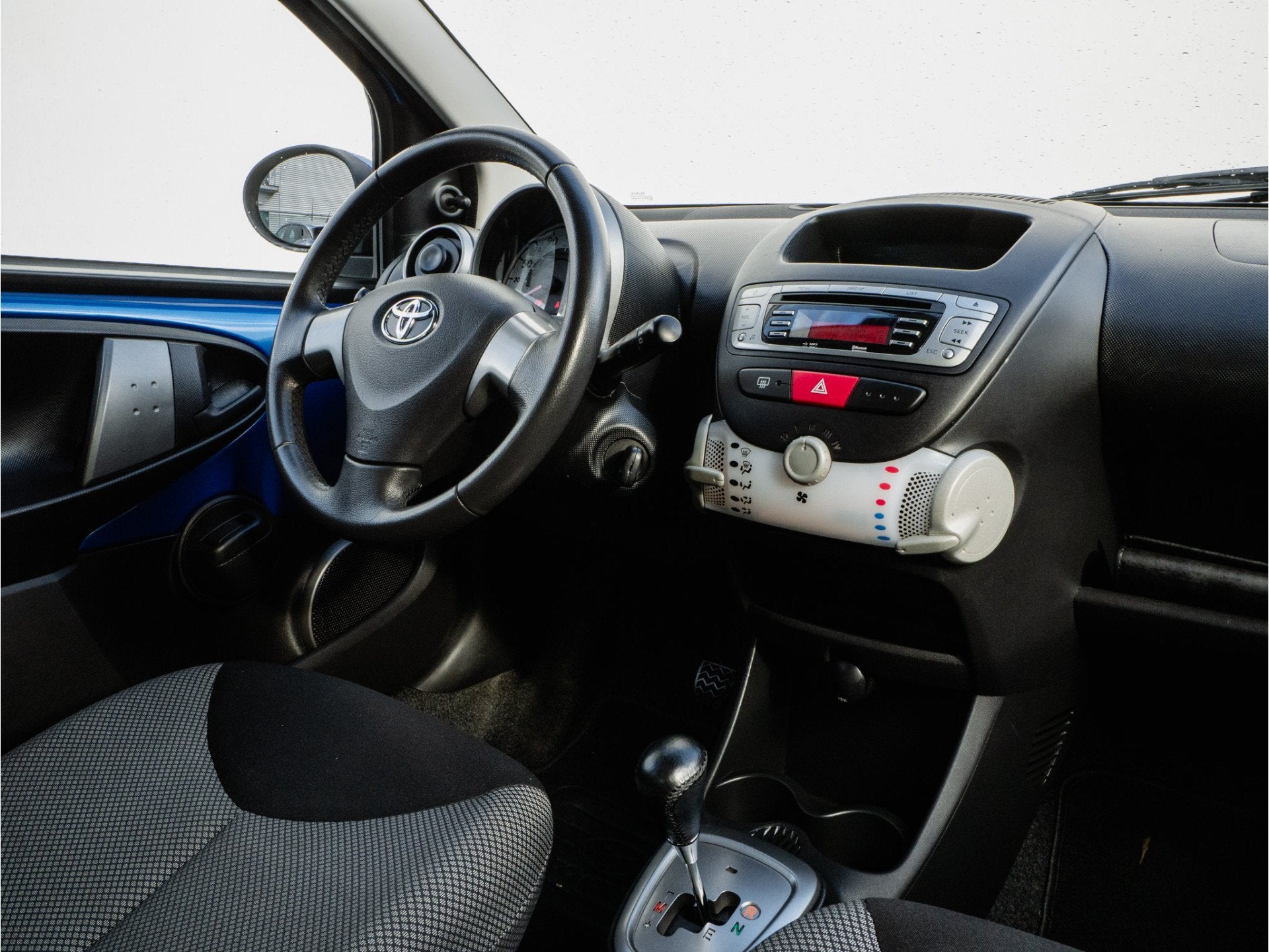 Toyota Aygo 1.0 VVT-i Aut. Aspiration Elek. ramen/ Radio-cd, Auto's, Euro 5, Stof, Gebruikt, Zwart