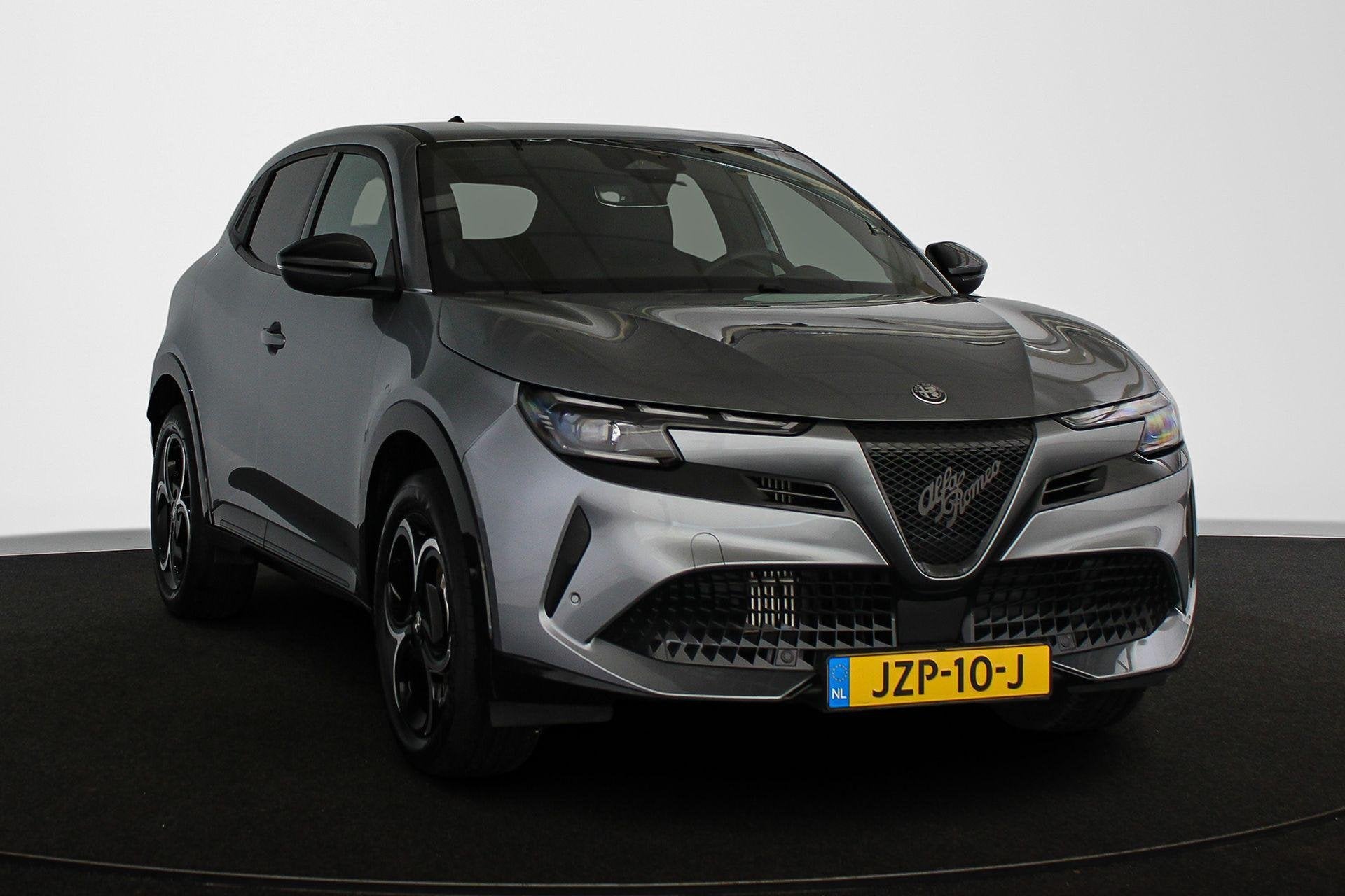 Alfa Romeo Junior 1.2 Turbo Hybrid Ibrida Ti Stoelverwarming, Auto's, 145 pk, 1199 cc, Origineel Nederlands, Bedrijf