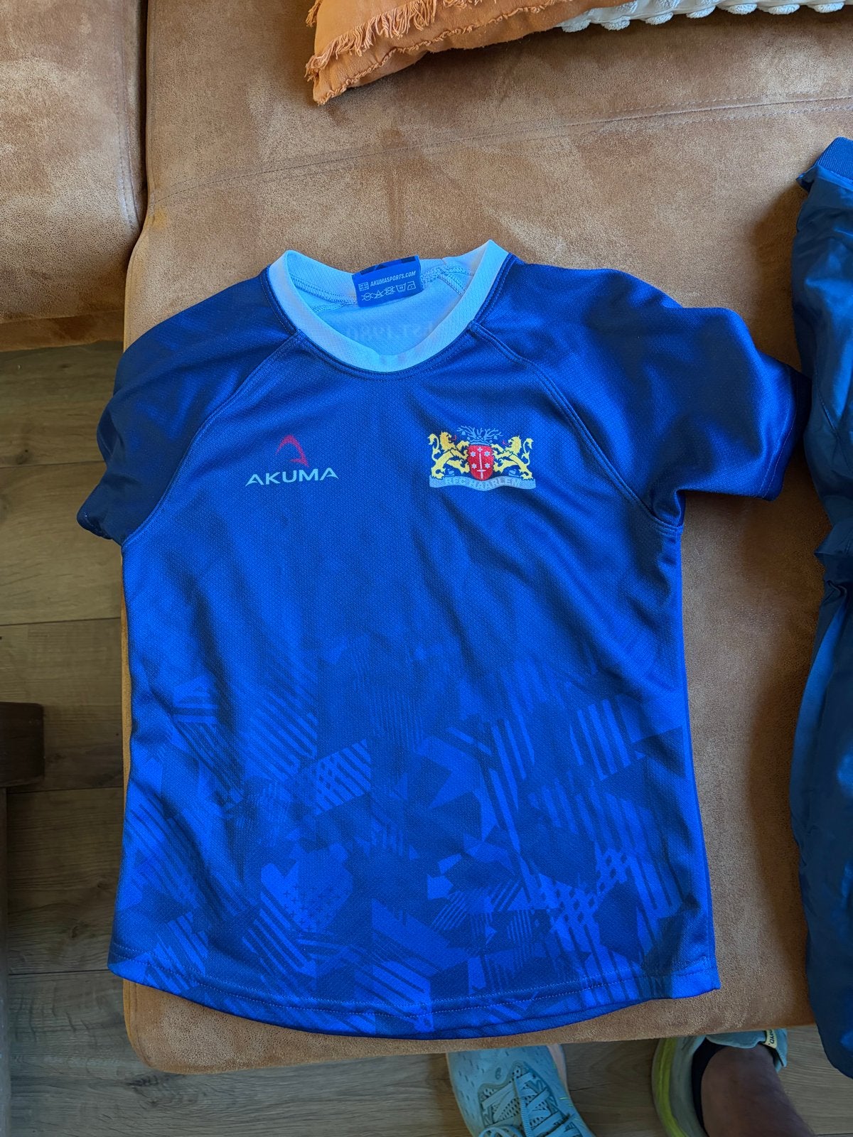 Akuma Rugby Shirt maat 28 en Windjack - Maat 10/12, Sport en Fitness, Ophalen of Verzenden, Gebruikt, Kleding