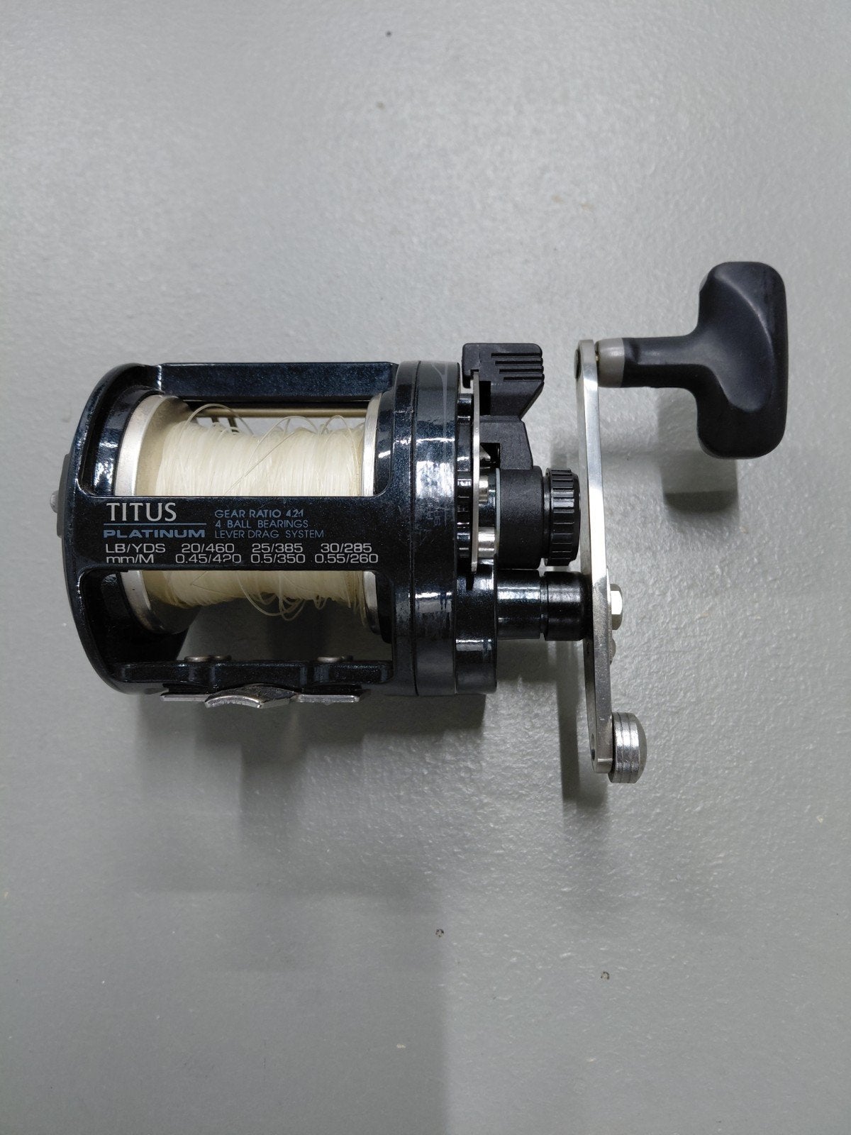 Okuma reel Titus Platinum Ultima RH 4bb 0,45/420m Zie tekst, Ophalen of Verzenden, Zo goed als nieuw, Molen