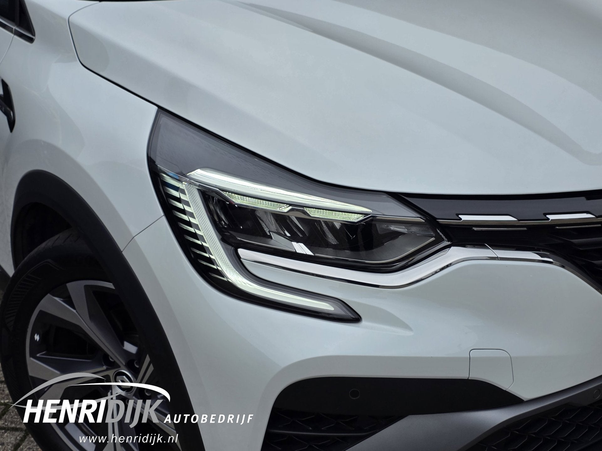 Renault Captur 1.6 E-Tech Hybrid 145 R.S. Line Navi / Camera, Auto's, 145 pk, Gebruikt, Zwart, Leder en Stof
